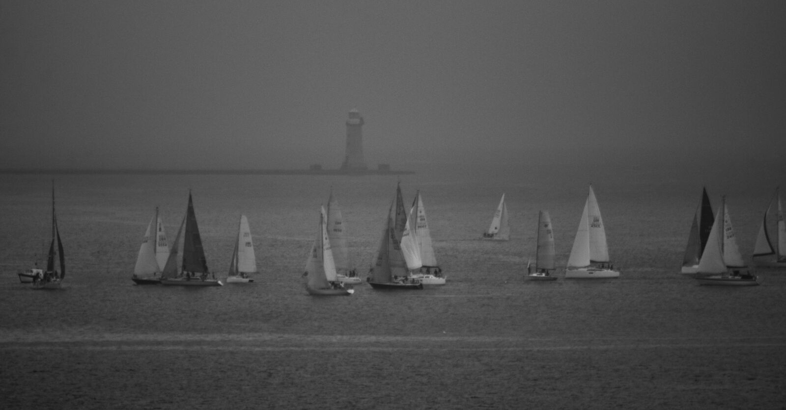 Sigma 70-300mm F4-5.6 APO DG Macro sample photo. Black, lighthouse, sailboats, seascape photography