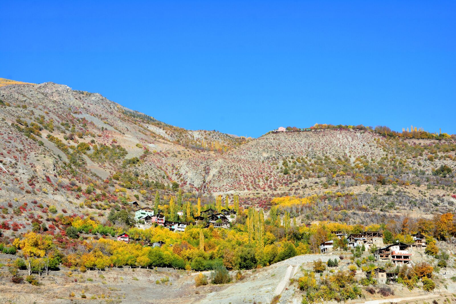 Nikon D7100 sample photo. Village, slope, valley photography