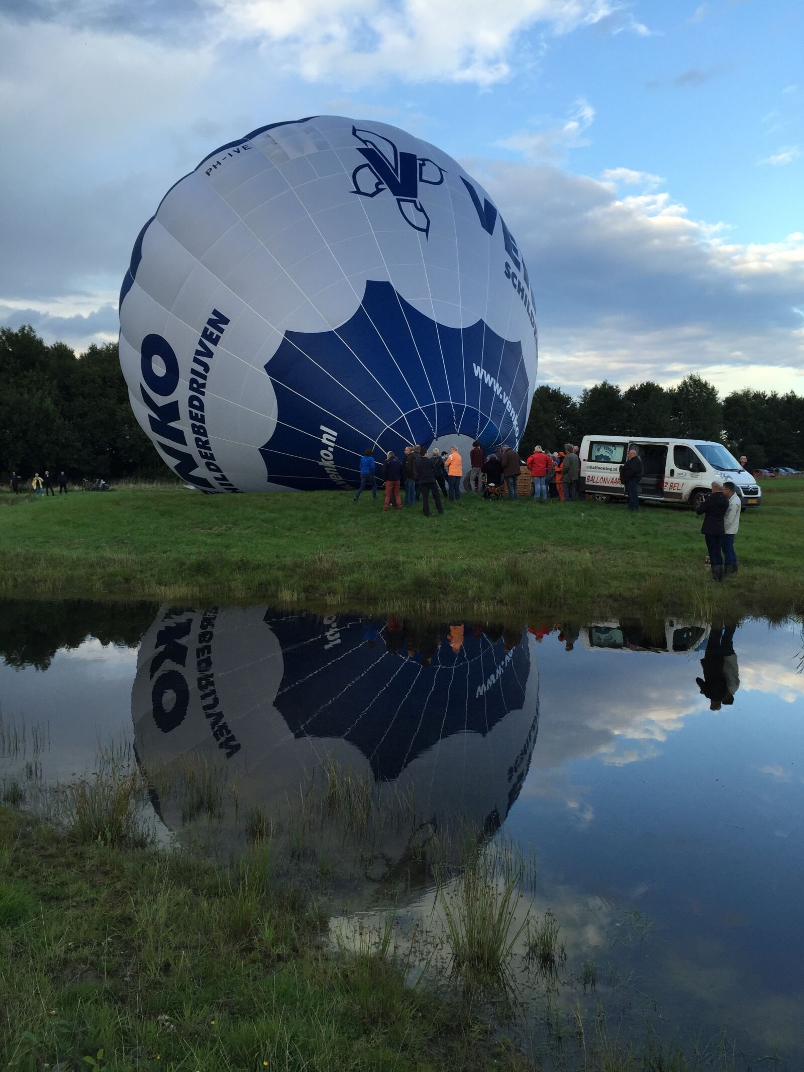 Apple iPhone 6 sample photo. Hot air balloon, water photography