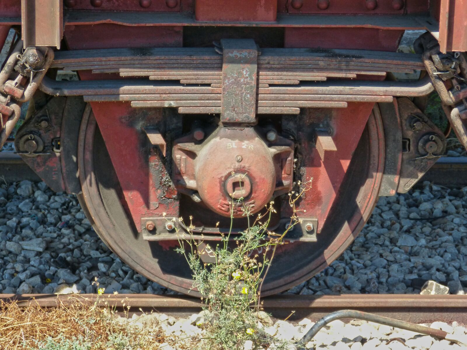 Panasonic DMC-FZ62 sample photo. Wheel, train, boje photography