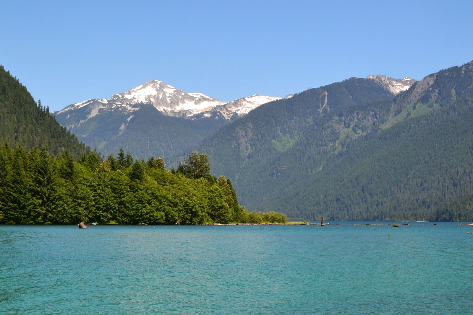 Nikon D3100 sample photo. Mountains, trees, water photography