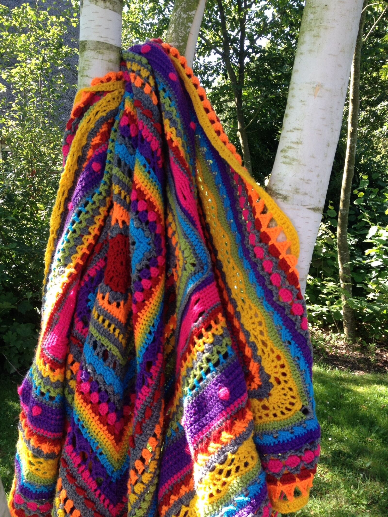 iPhone 4S back camera 4.28mm f/2.4 sample photo. Blanket, colors, hooks photography