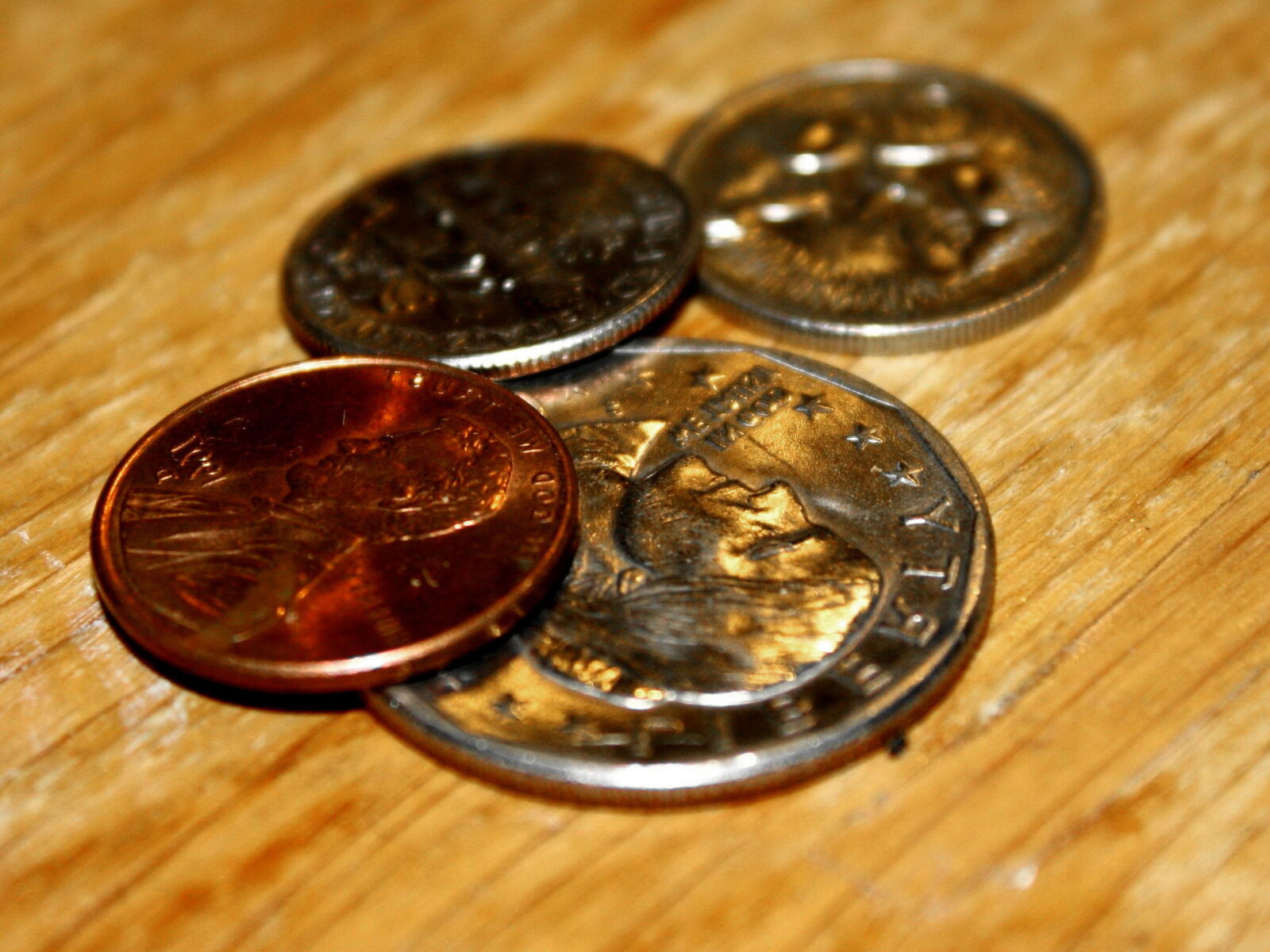 f/3.5-5.6 IS sample photo. Coins, economy photography