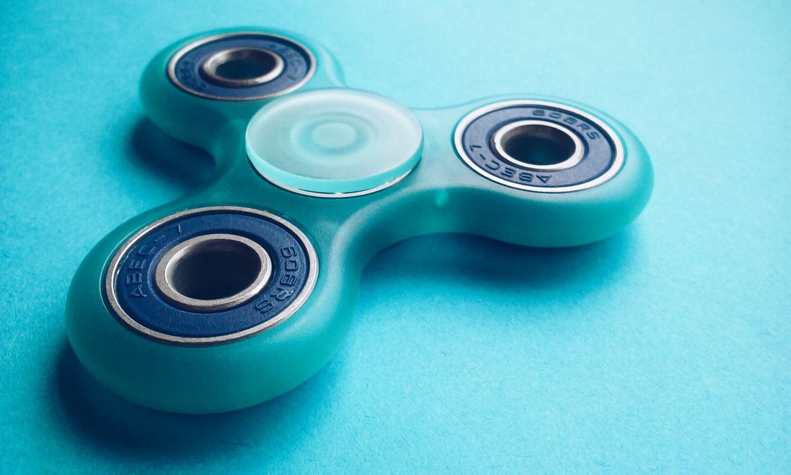 LG F60 sample photo. Fidget spinner, toy, game photography