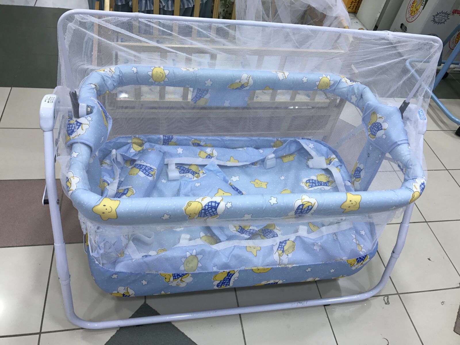iPhone 7 Plus back dual camera 3.99mm f/1.8 sample photo. Baby, bed, swing photography