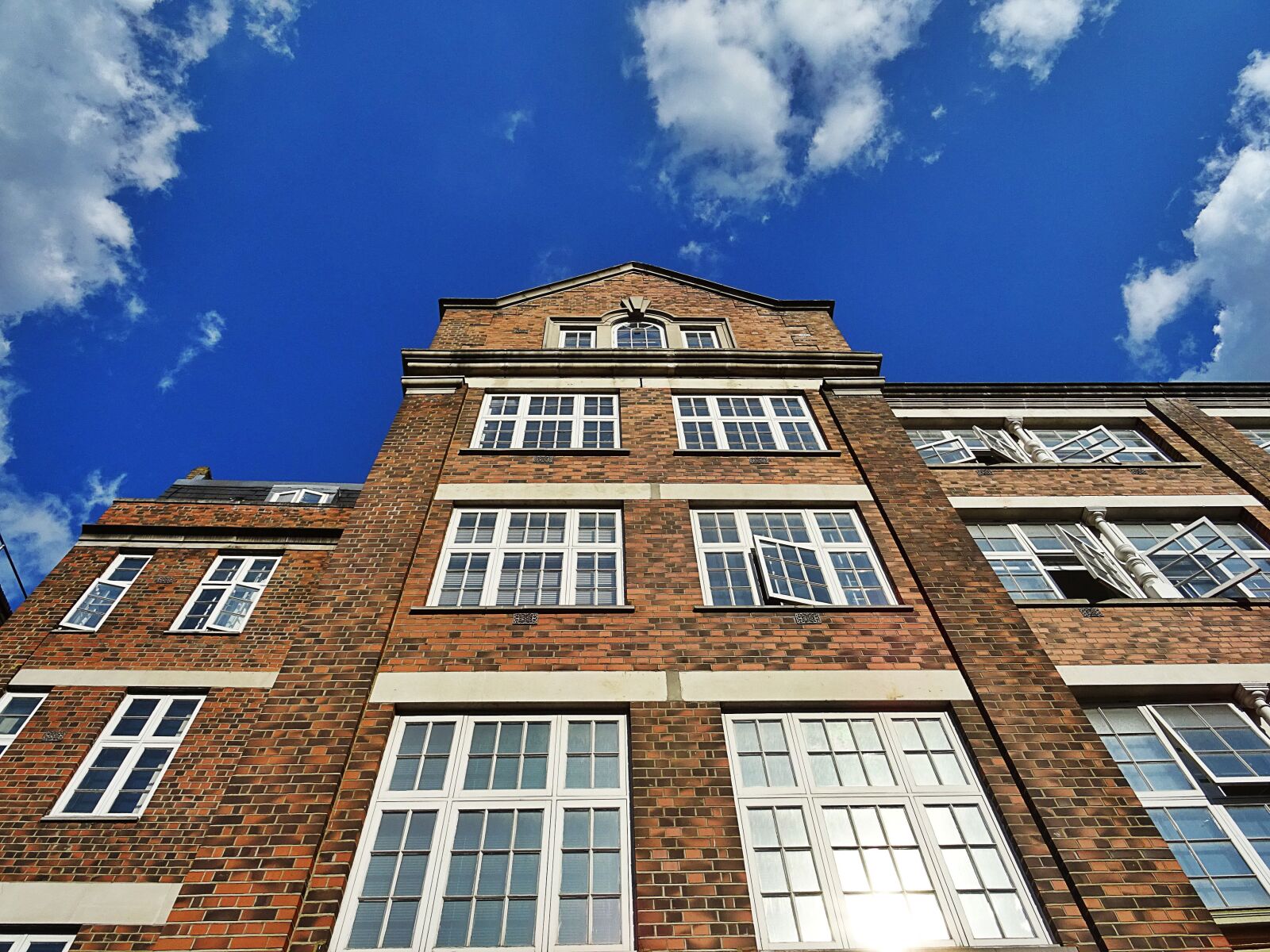 Sony DSC-HX60 sample photo. Architecture, bricks, building, clouds photography