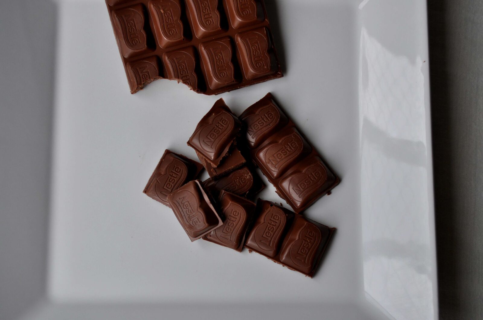 Nikon D5000 sample photo. Swiss, chocolate, white plate photography