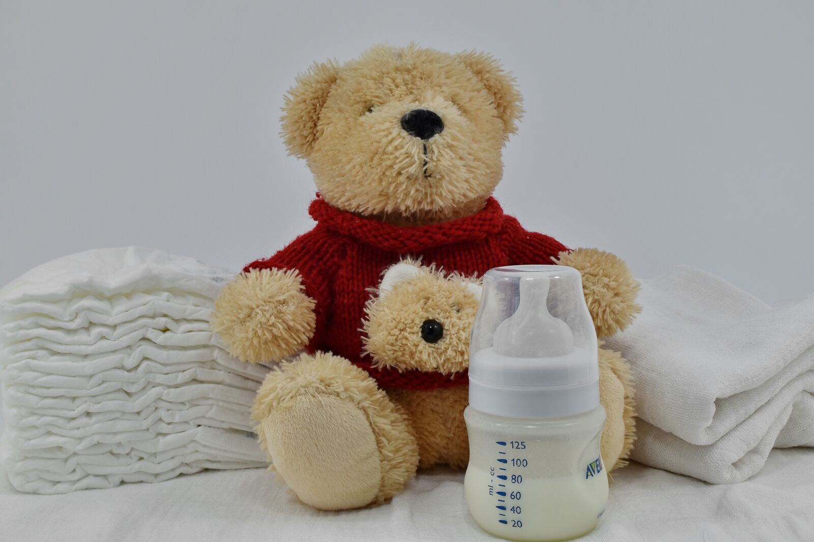 Nikon D5500 sample photo. Bottle, cotton, diaper, innocence photography