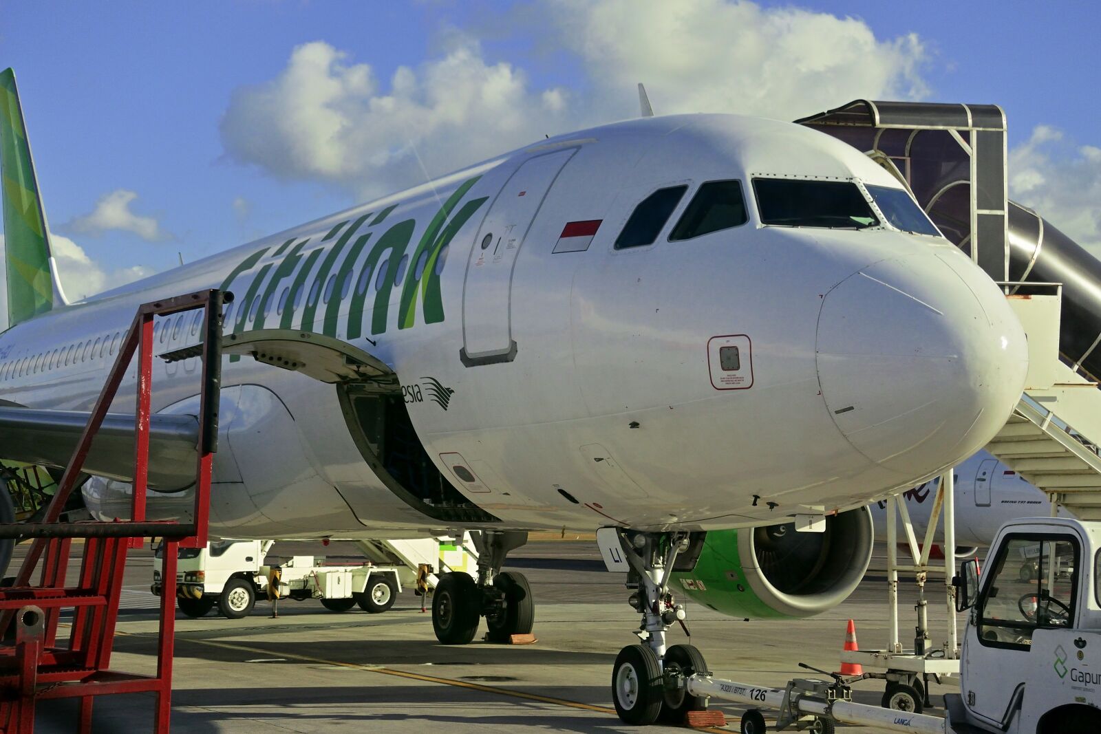 Nikon 1 Nikkor VR 10-30mm F3.5-5.6 PD-Zoom sample photo. Plane, citilink indonesia, airport photography