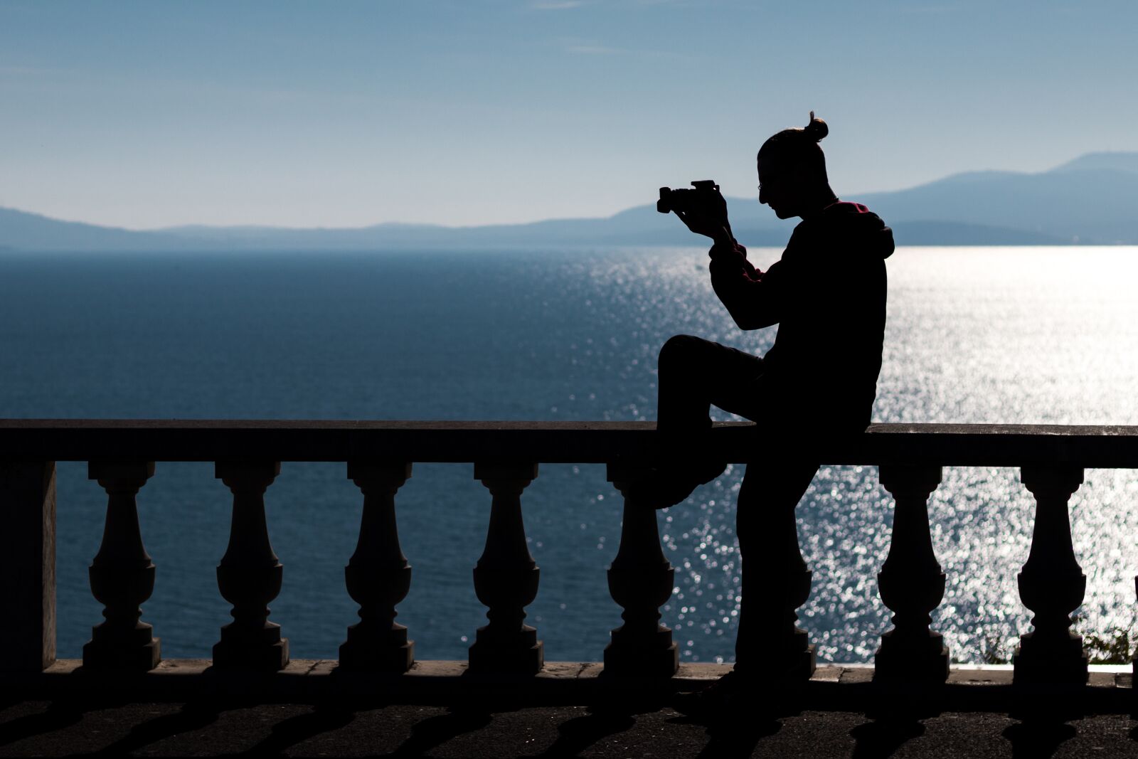 Canon EF 50mm F1.8 STM sample photo. Silhouette, man, camera photography
