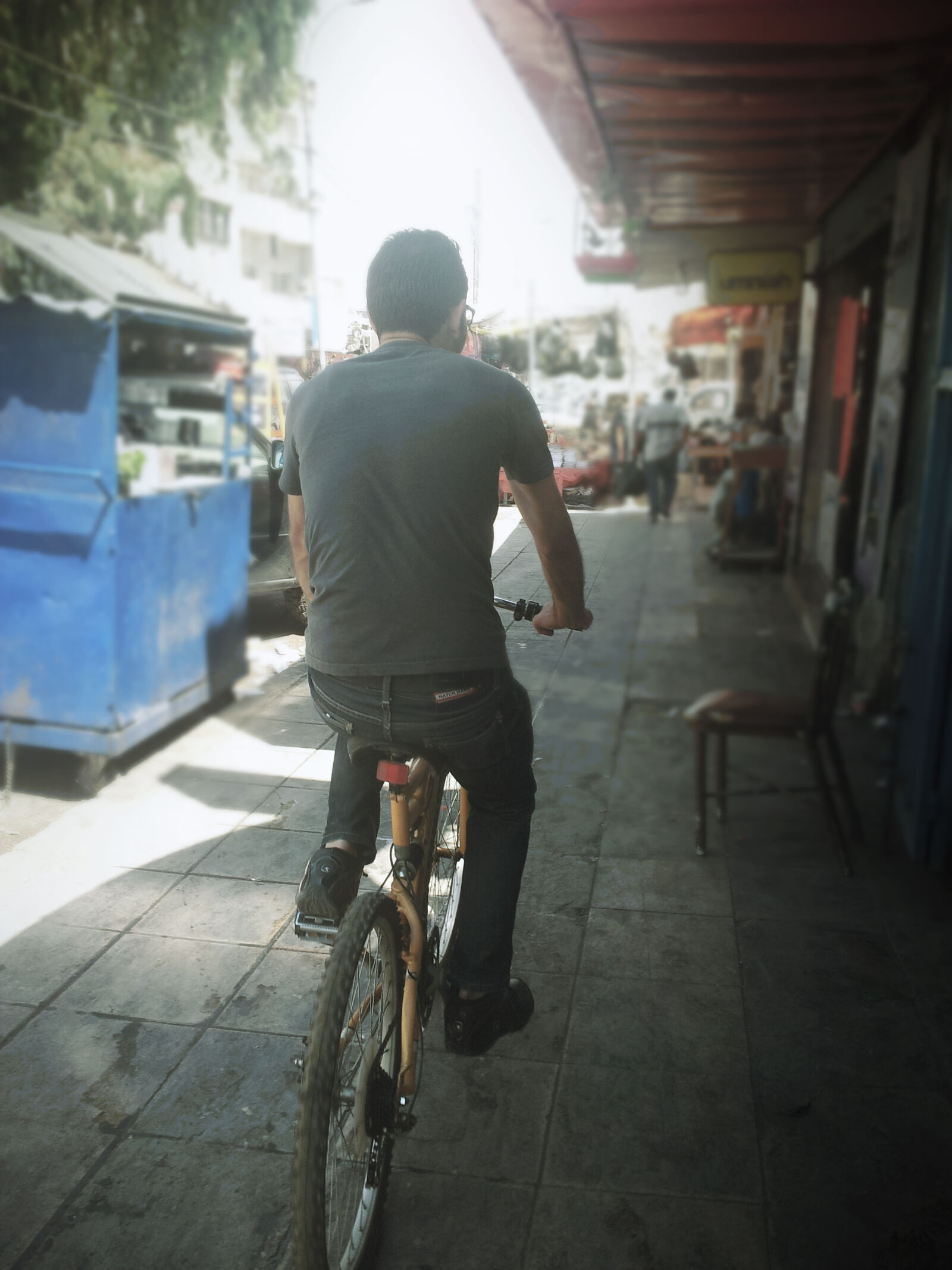 Samsung Galaxy S2 sample photo. Bike, man, riding, street photography
