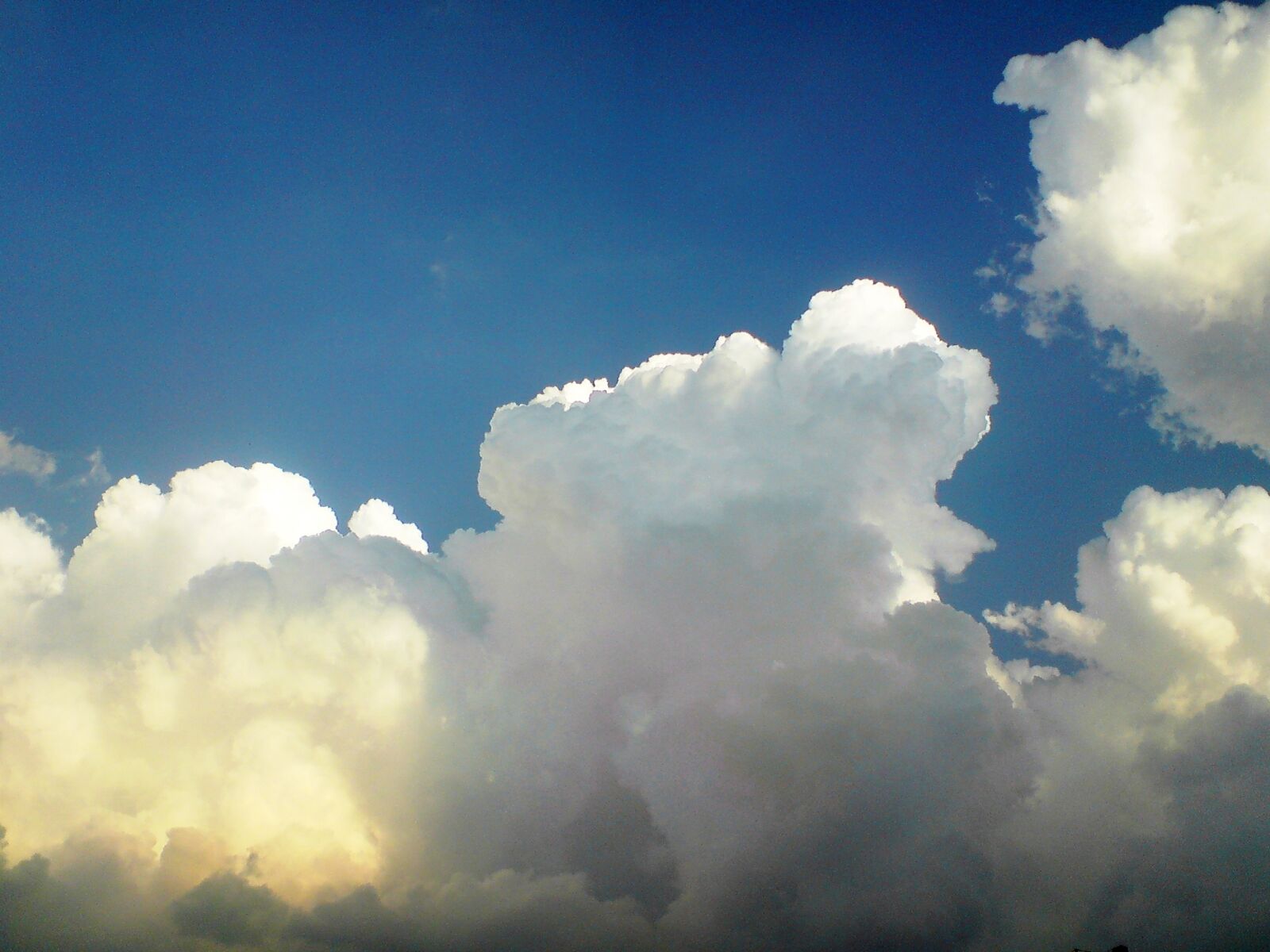 Sony Ericsson K850i sample photo. Clouds, sky, blue photography