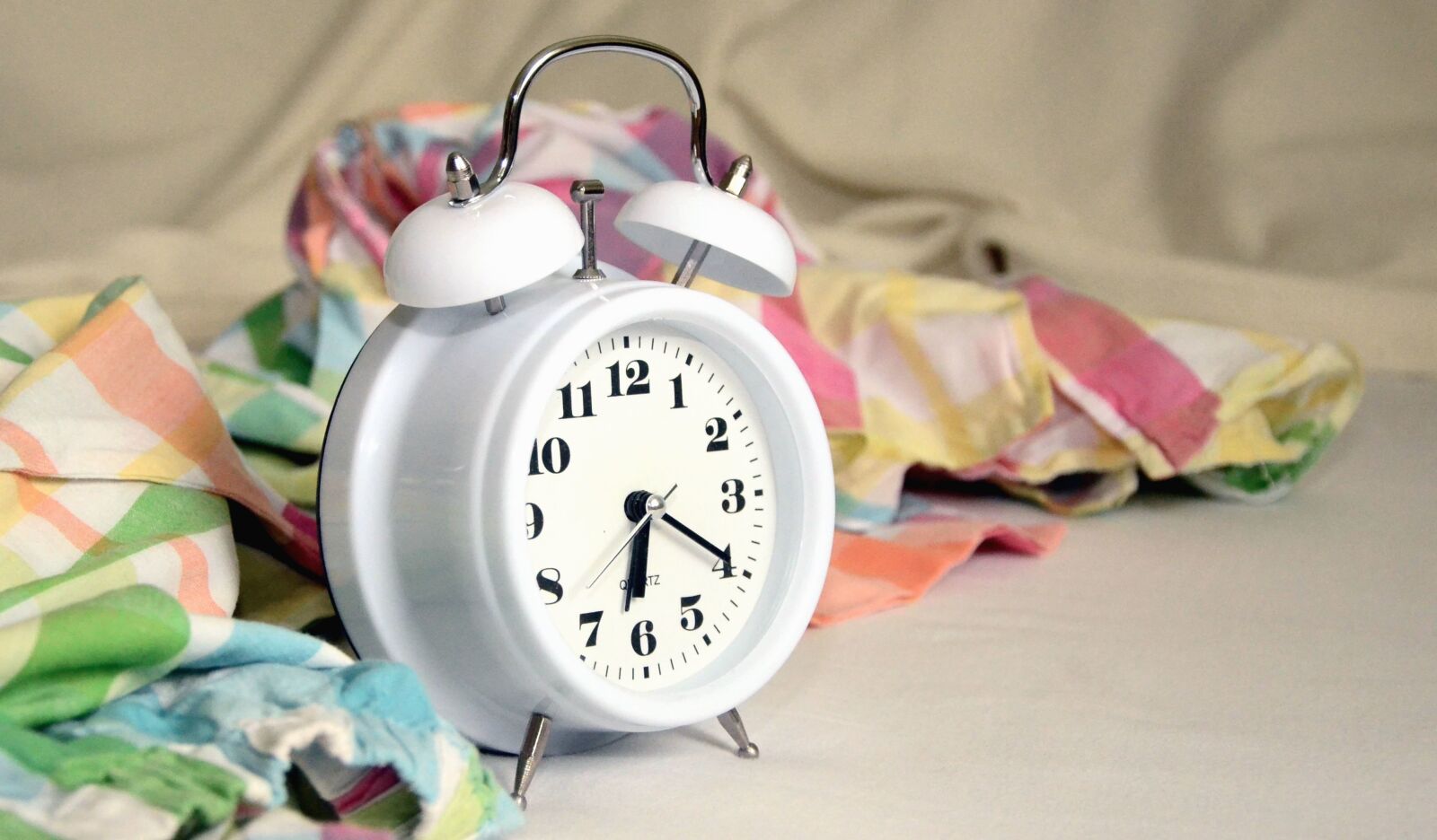 Nikon D5100 sample photo. Scarf, alarm clock, hour photography