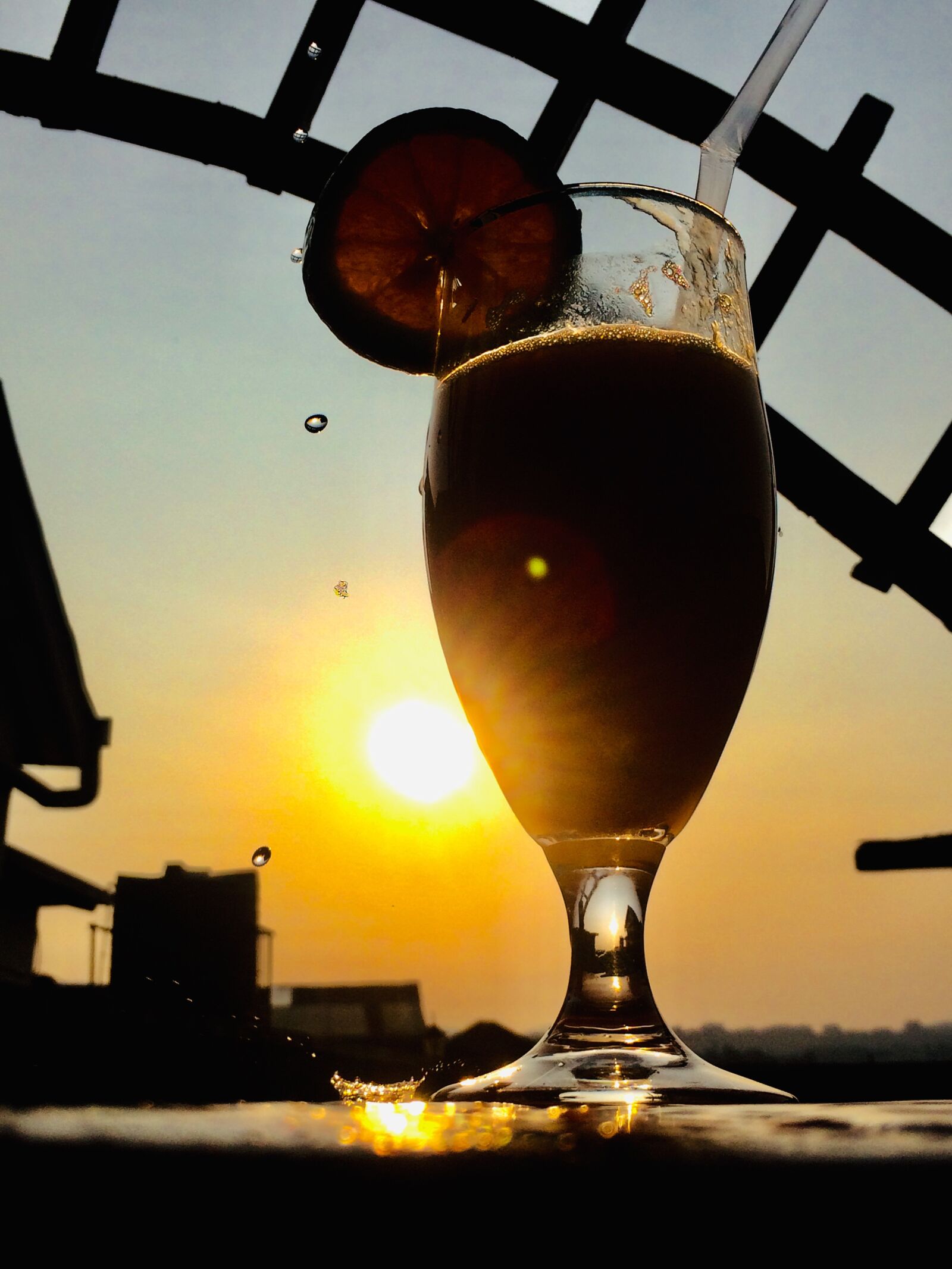 iPhone 5s back camera 4.15mm f/2.2 sample photo. Sunset, juice glass, drops photography