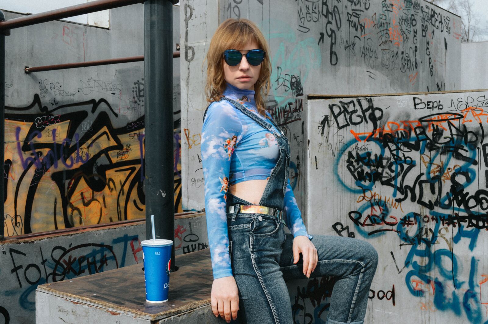 Nikon D3200 sample photo. Denim jumpsuit, backpack, graffiti photography