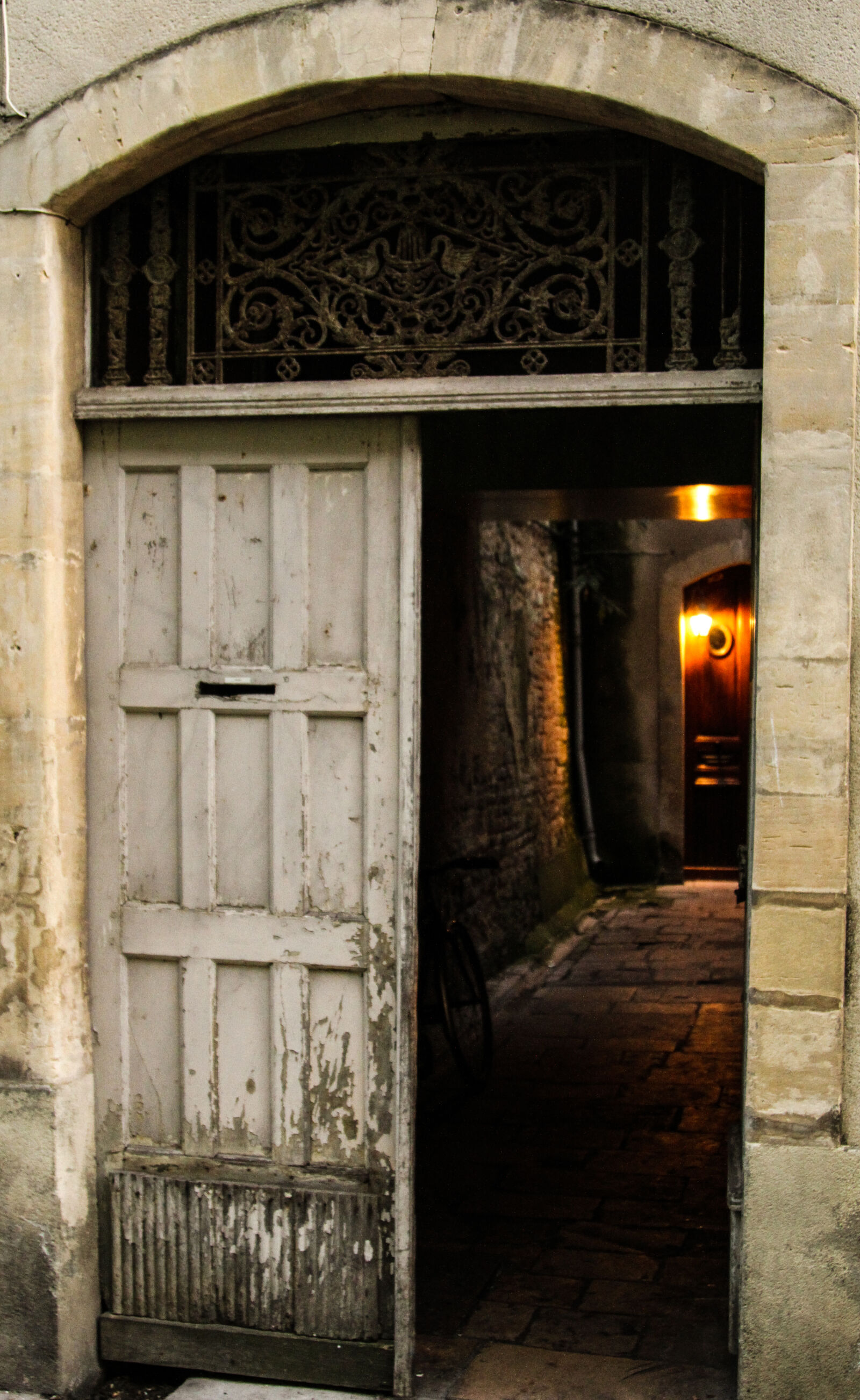 Canon EF 24-105mm F4L IS USM sample photo. Bike, cobbles, door, iron photography