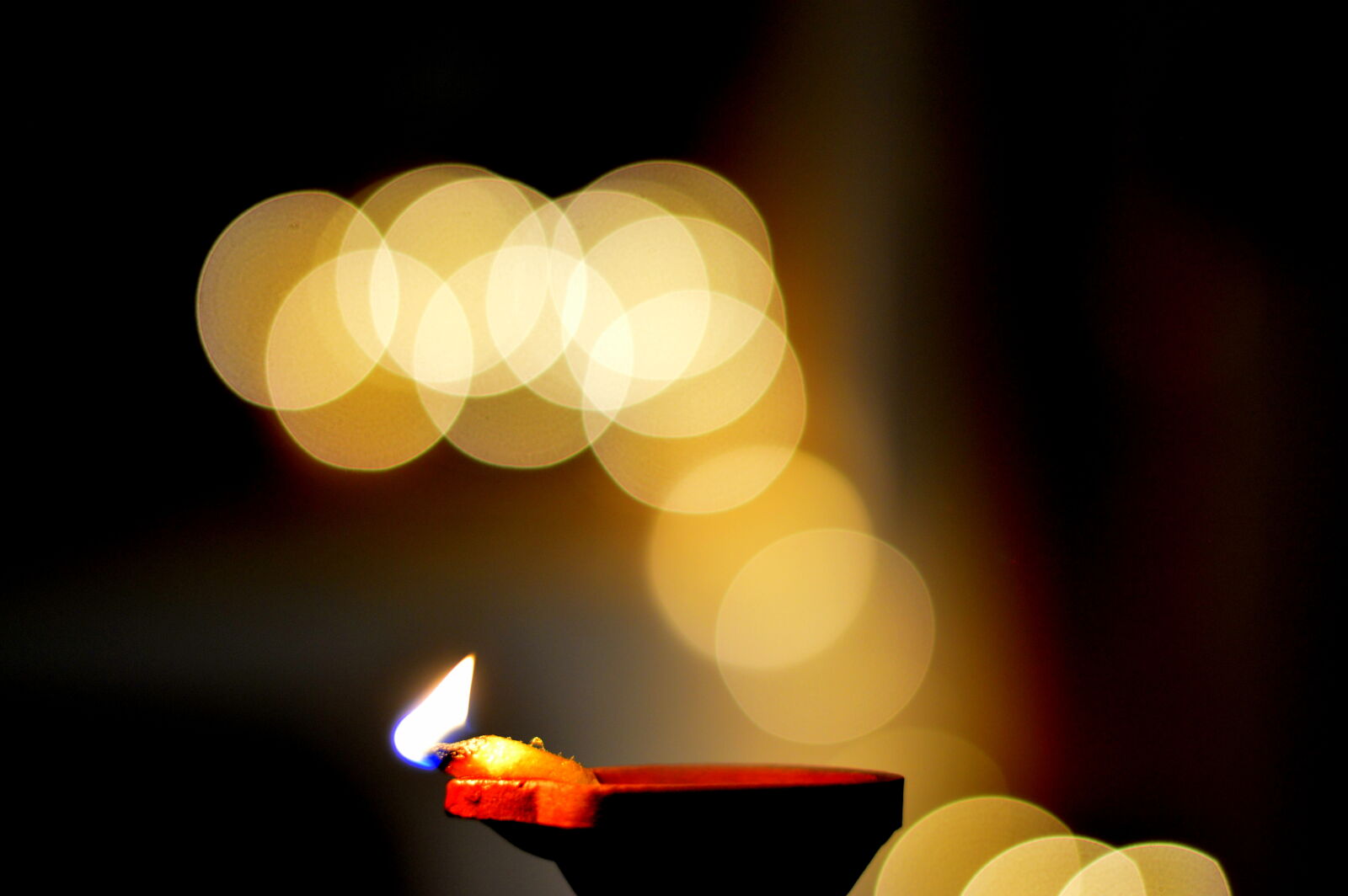 Nikon D3200 + Nikon AF-S Nikkor 50mm F1.8G sample photo. Blurred, bokeh, candle, fire photography