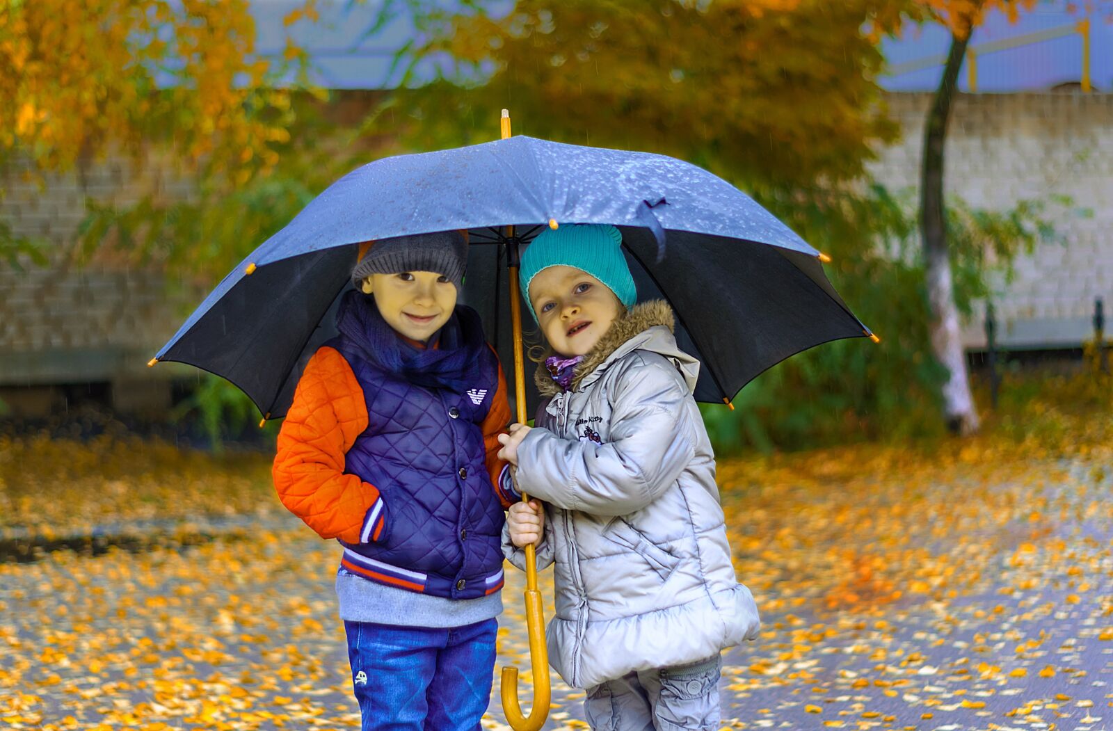 Nikon D90 sample photo. Kids, rain, umbrella photography