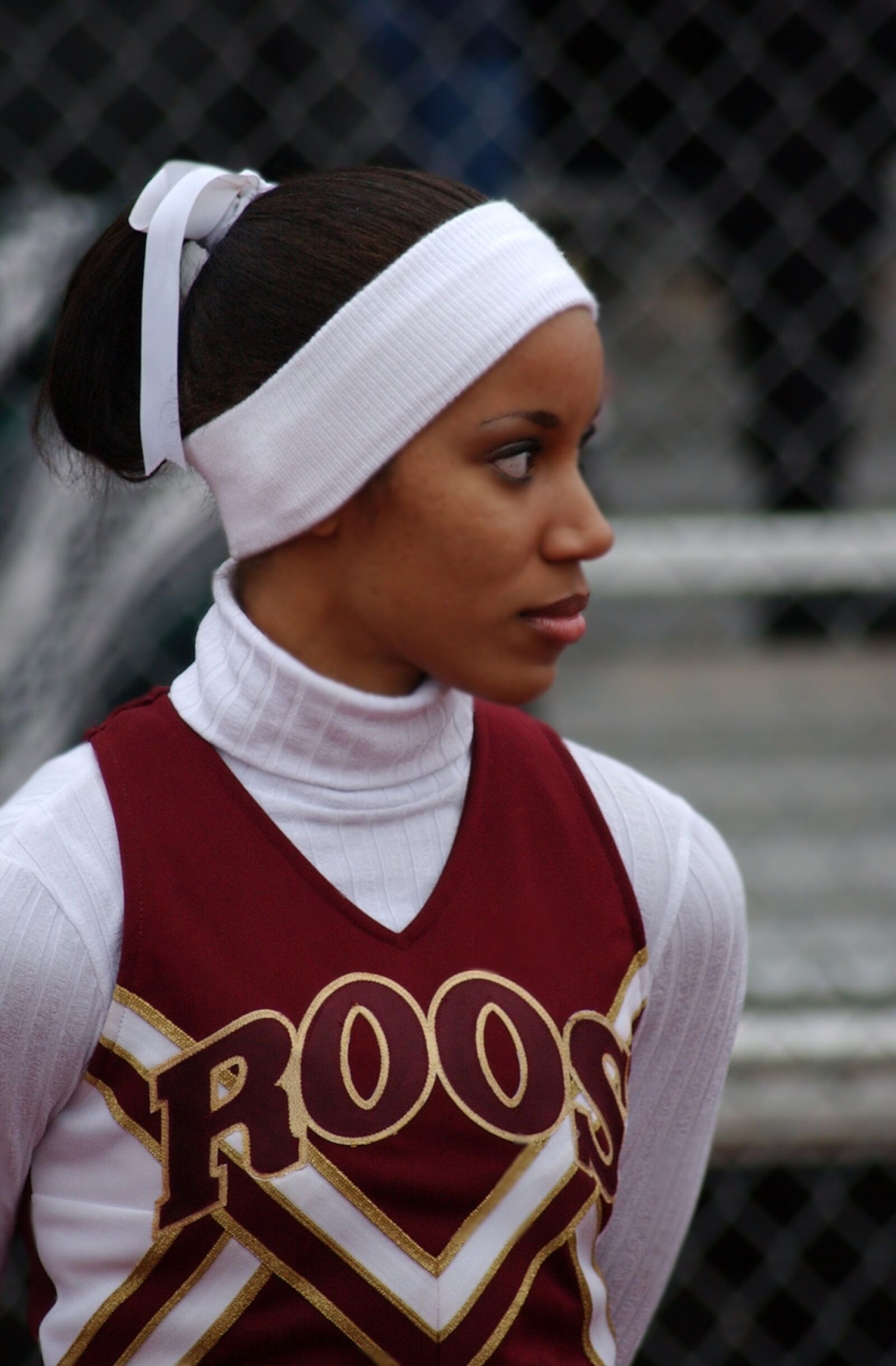 Nikon D1H sample photo. Cheerleader, female, football game photography