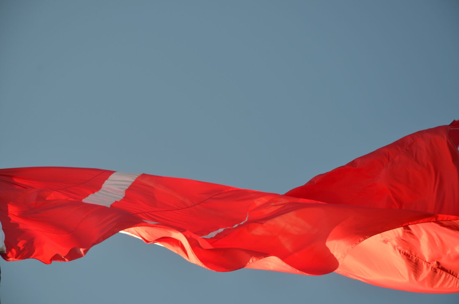Nikon D7000 sample photo. Sky, flag, fluctuation photography