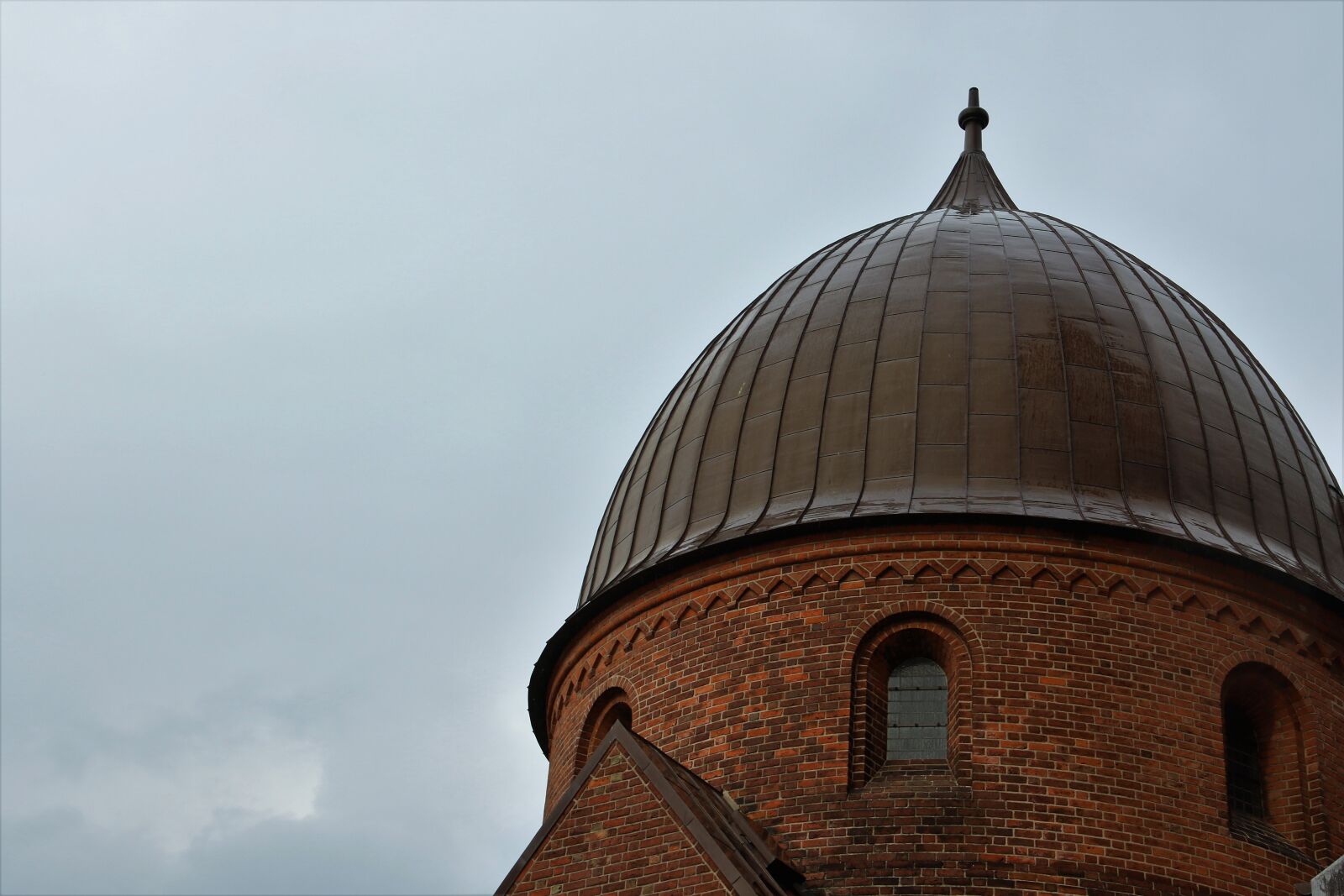 Canon EOS 7D Mark II sample photo. Arched, windows, bricks, church photography
