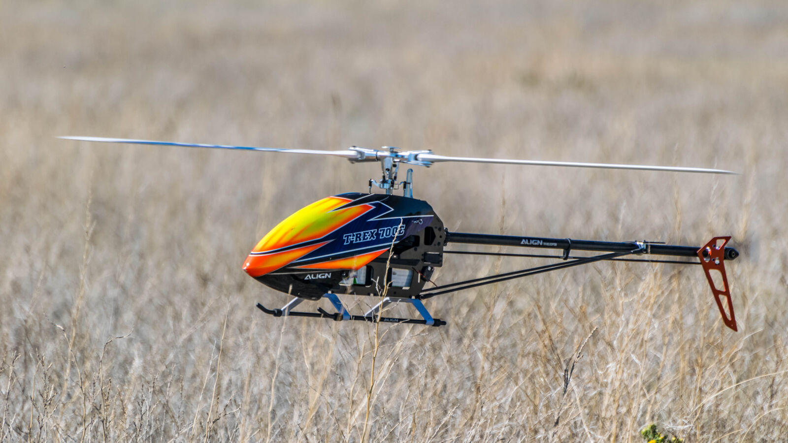 Nikon AF-S Nikkor 70-300mm F4.5-5.6G VR sample photo. Drone, field, grass, helicopter photography