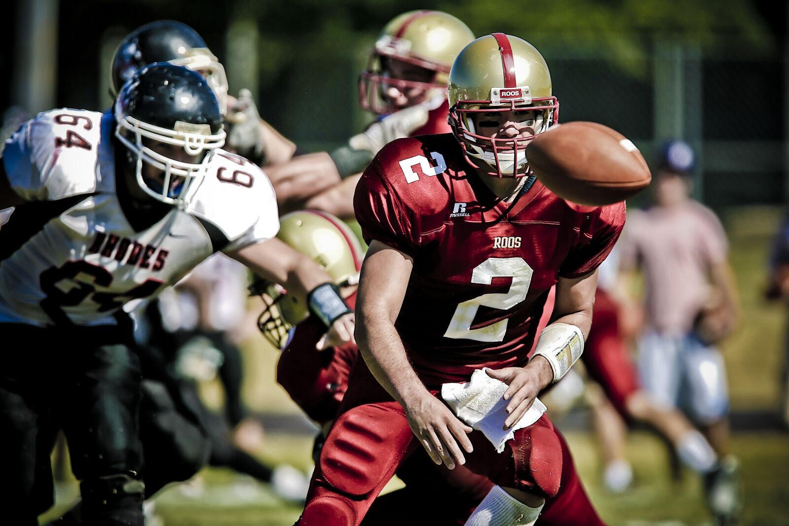 Canon EOS-1D Mark II N sample photo. Quarterback, pitch, action photography