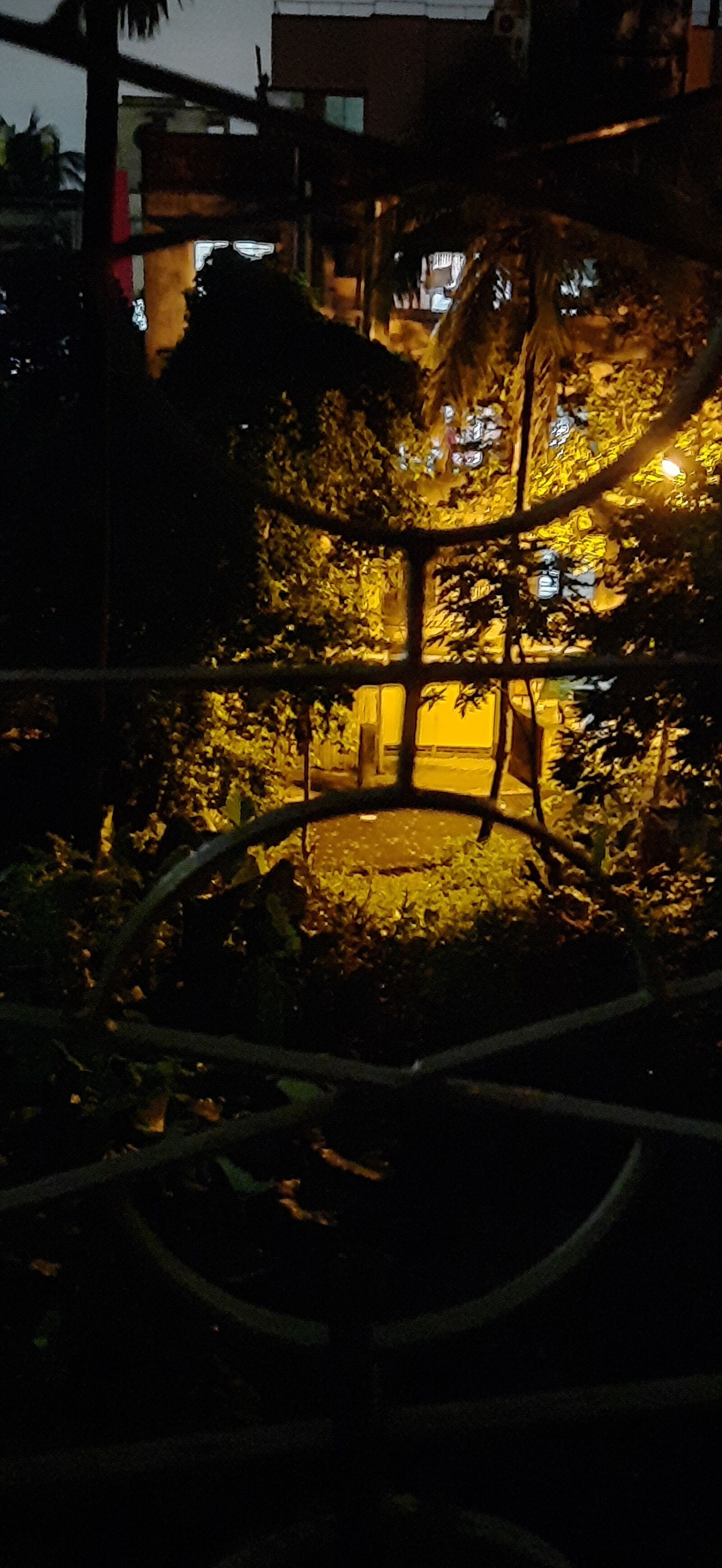 Samsung SM-M215F sample photo. Night view, window, light photography