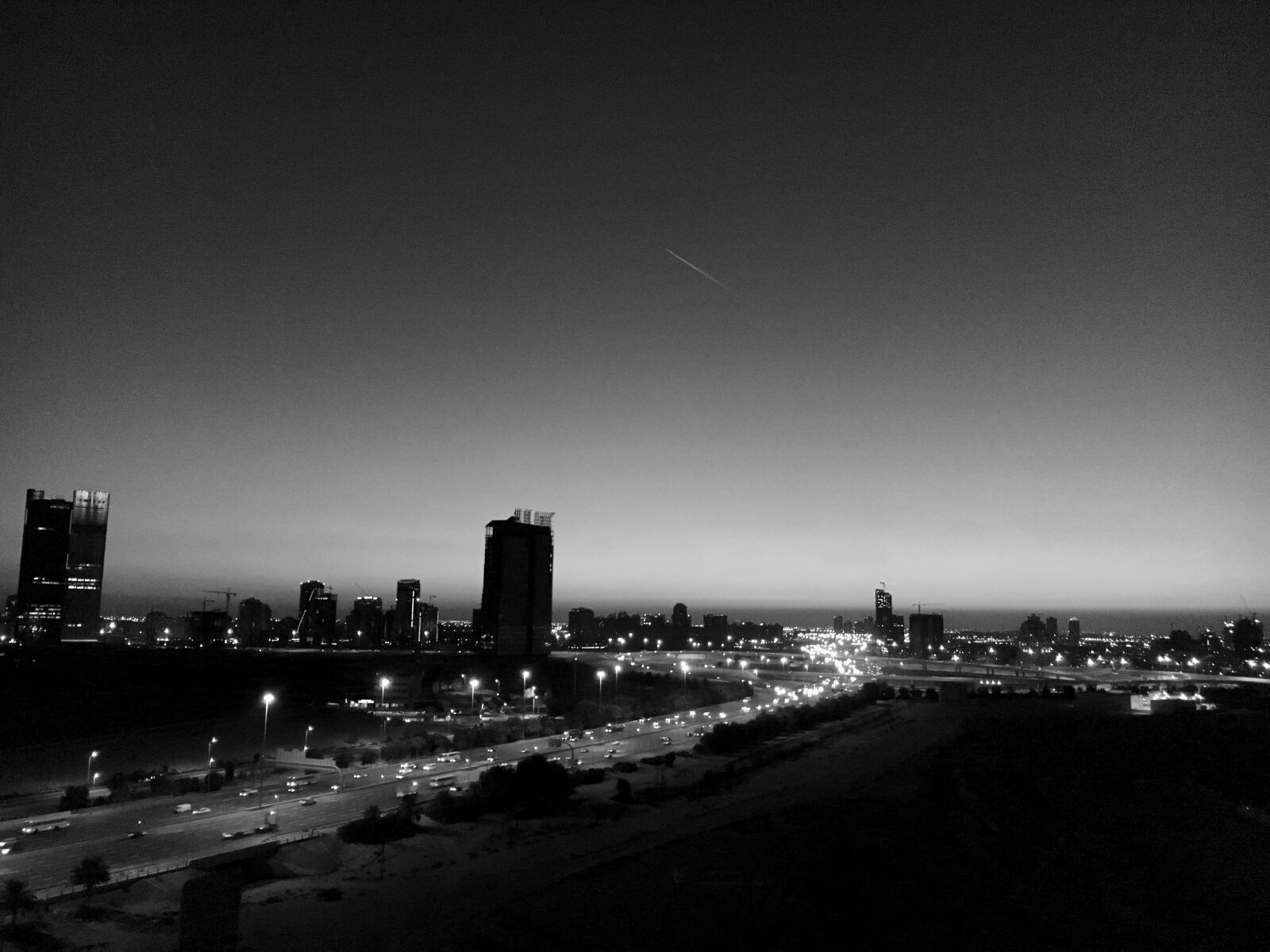 Apple iPhone 6s sample photo. Illuminated, cityscape, against, sky photography