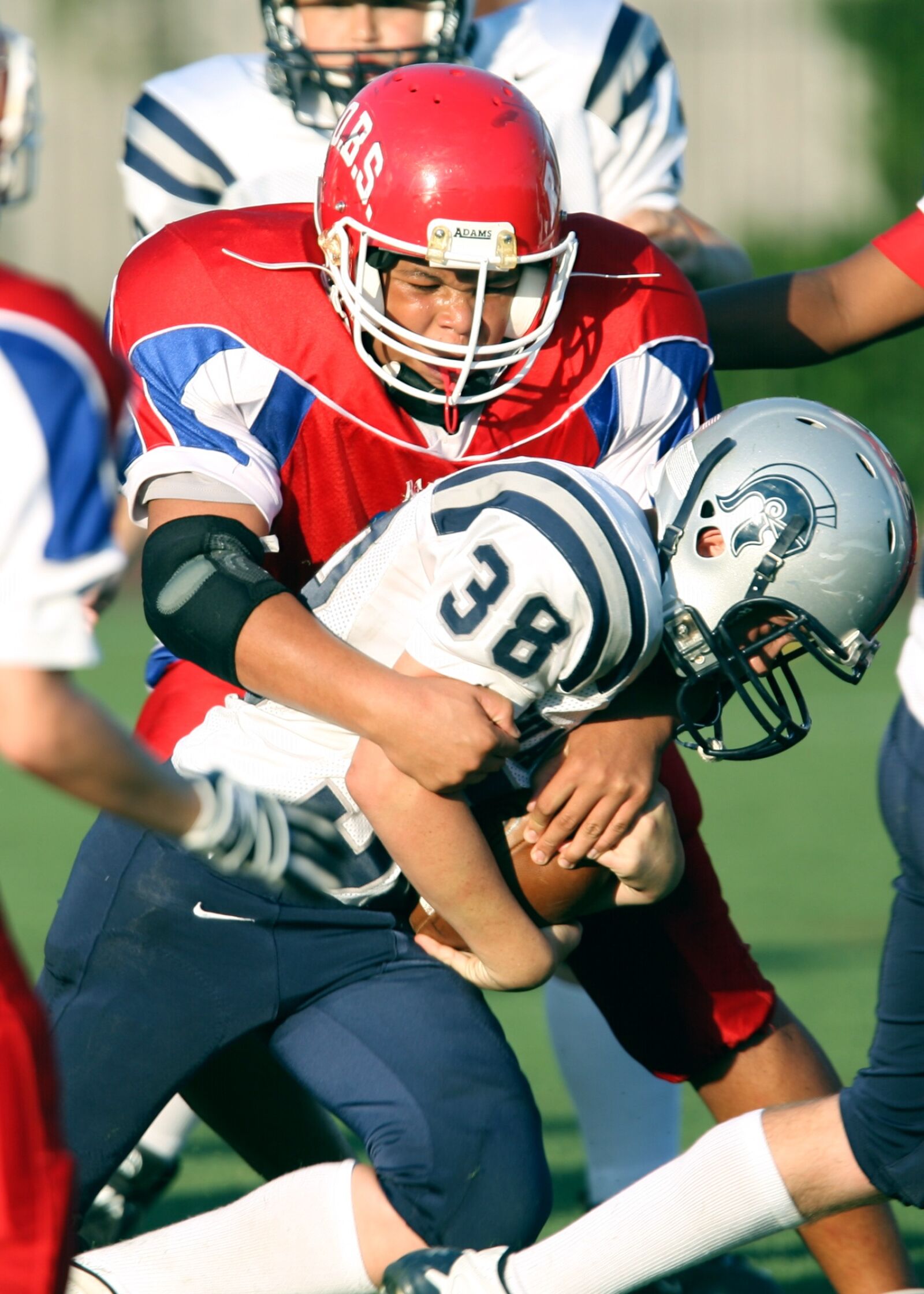 Canon EOS-1D Mark II N sample photo. American football, tackle, game photography