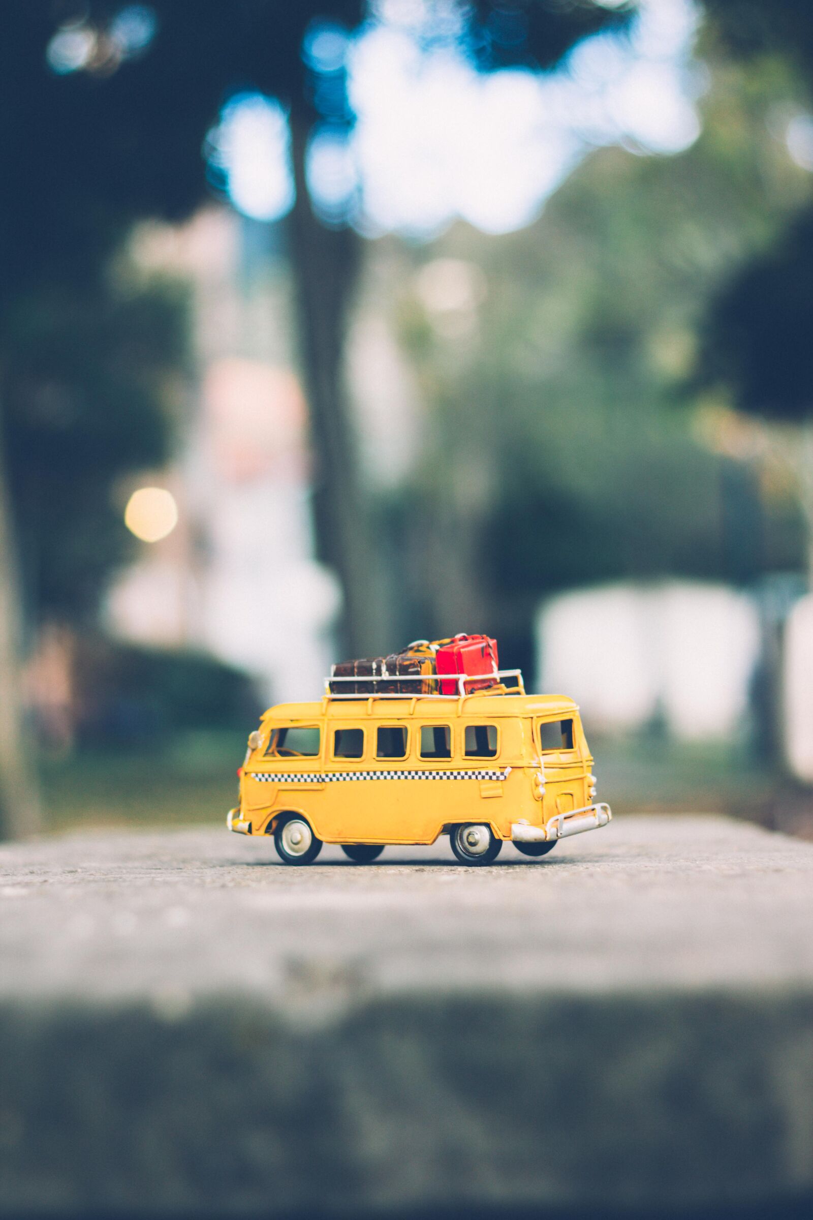 Canon EOS 60D + Canon EF 50mm F1.8 II sample photo. Blurred, miniature, toy, taxi photography