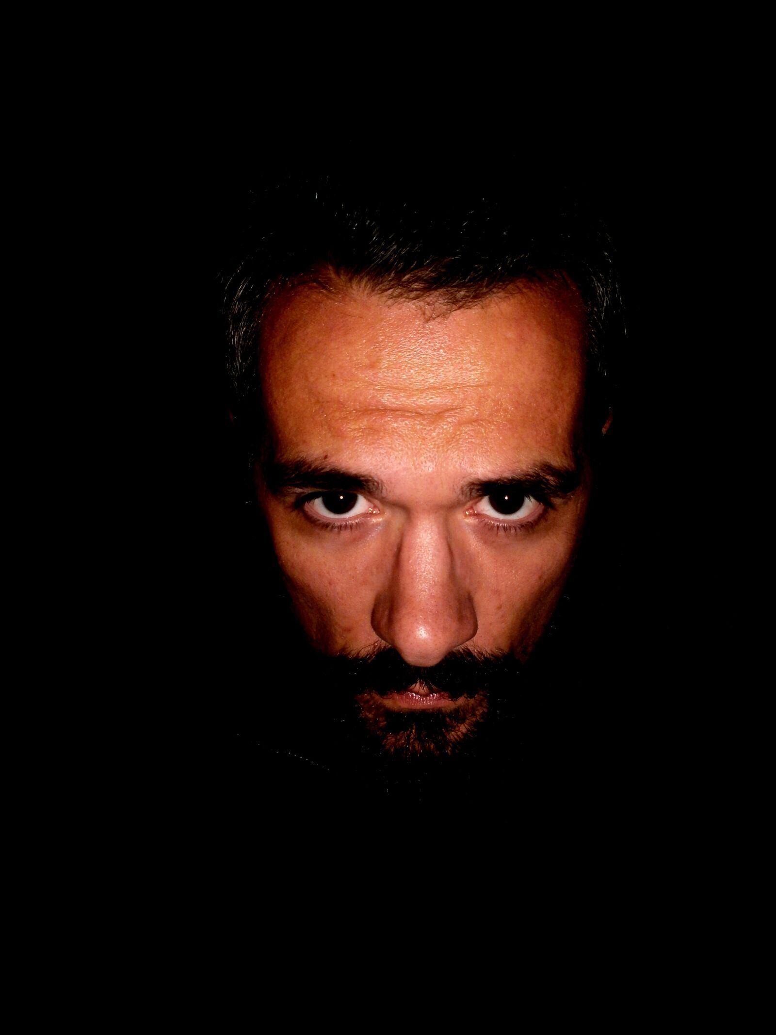 Olympus VG110,D700 sample photo. Man, dark, face photography