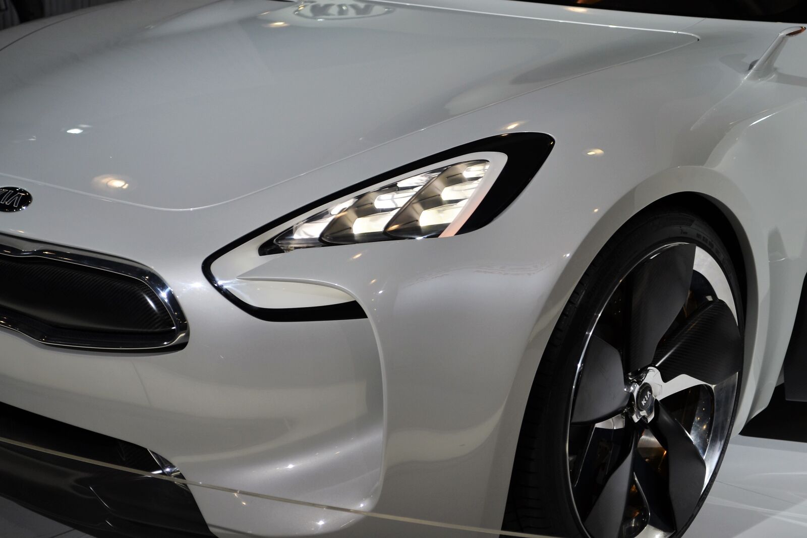 Nikon D3100 sample photo. Kia sports car, white photography