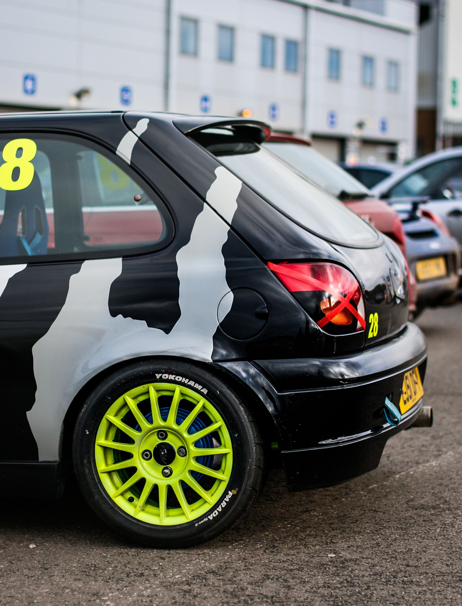 Canon EOS 70D + Canon EF 50mm F1.4 USM sample photo. Ford fiesta, green, track photography