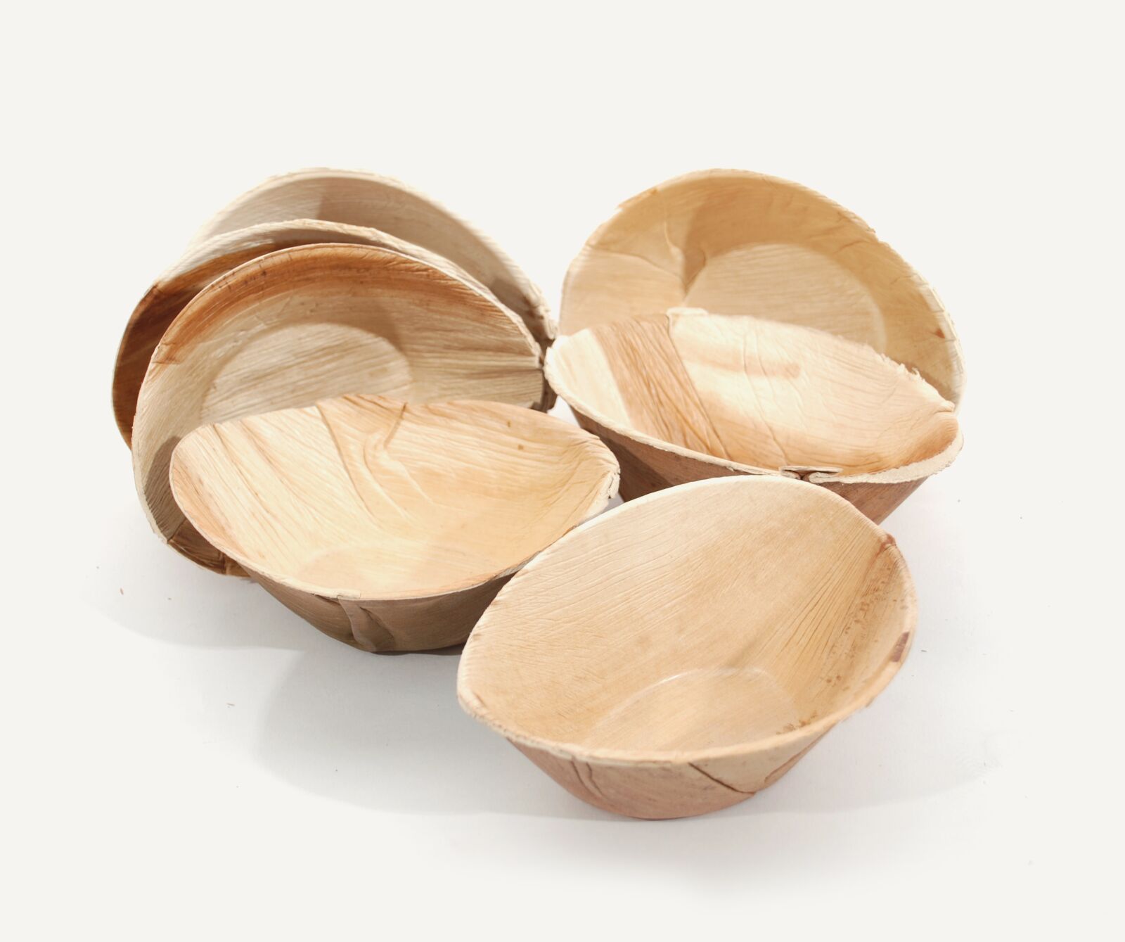 Nikon D80 sample photo. Round, plates, palm leaf photography