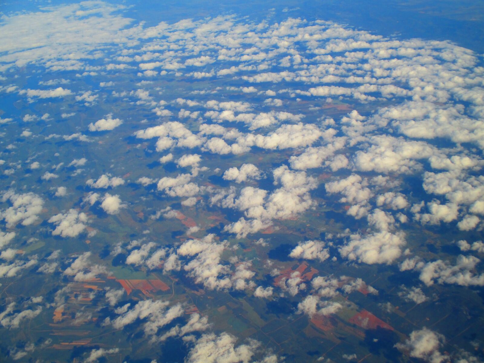 Canon PowerShot ELPH 115 IS (IXUS 132 / IXY 90F) sample photo. Plane, clouds, landscape photography