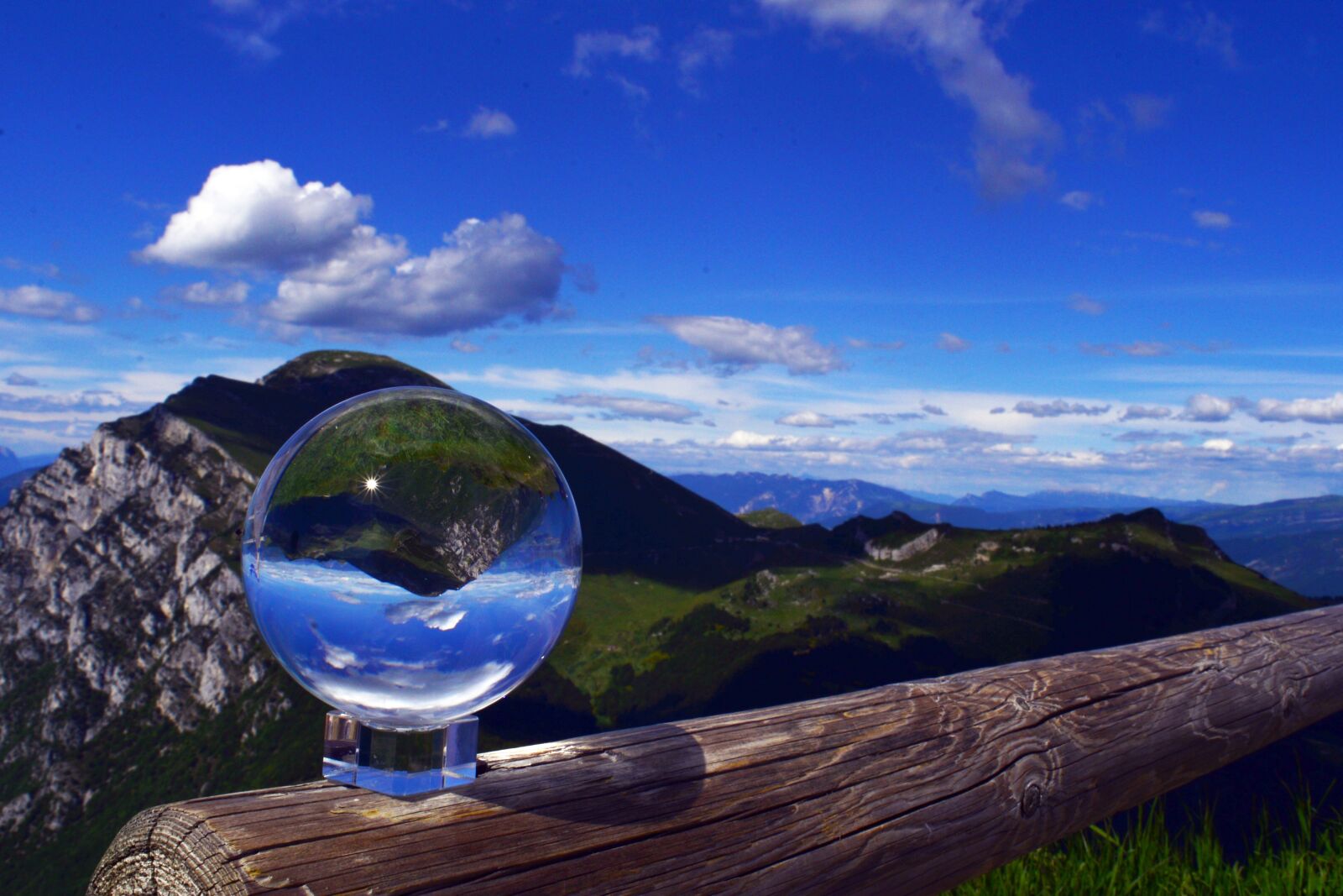 Nikon D610 sample photo. Lensball, mountains, clouds photography