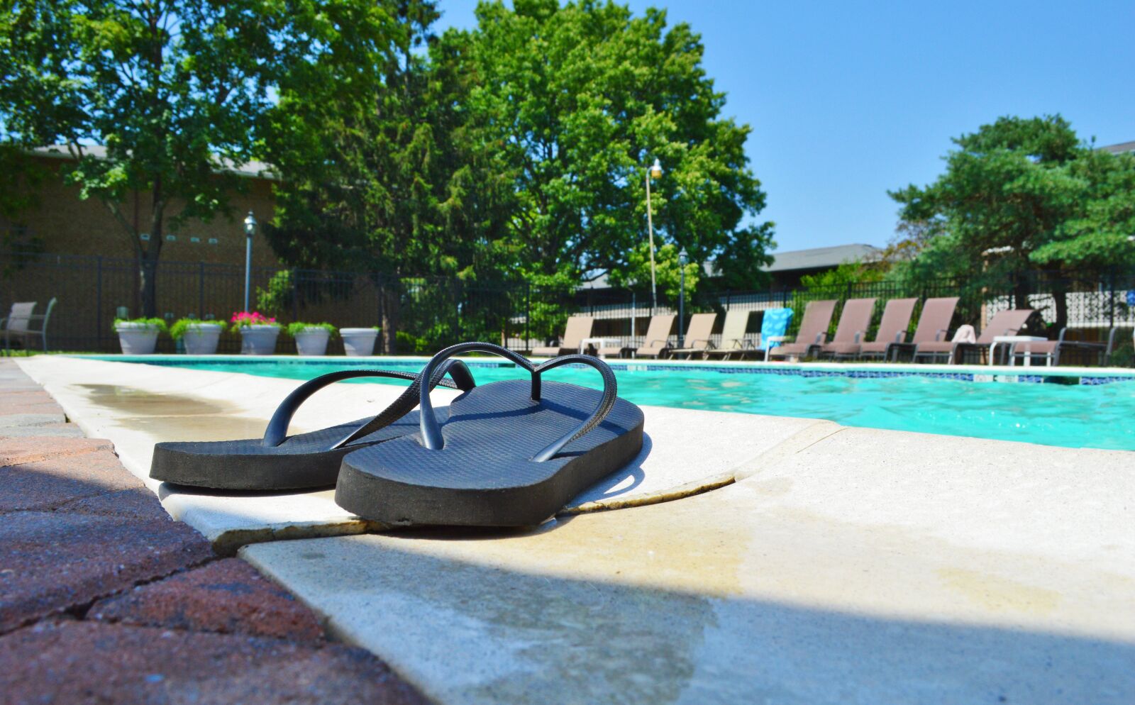 Nikon D3200 sample photo. Flip flops, pool, summer photography