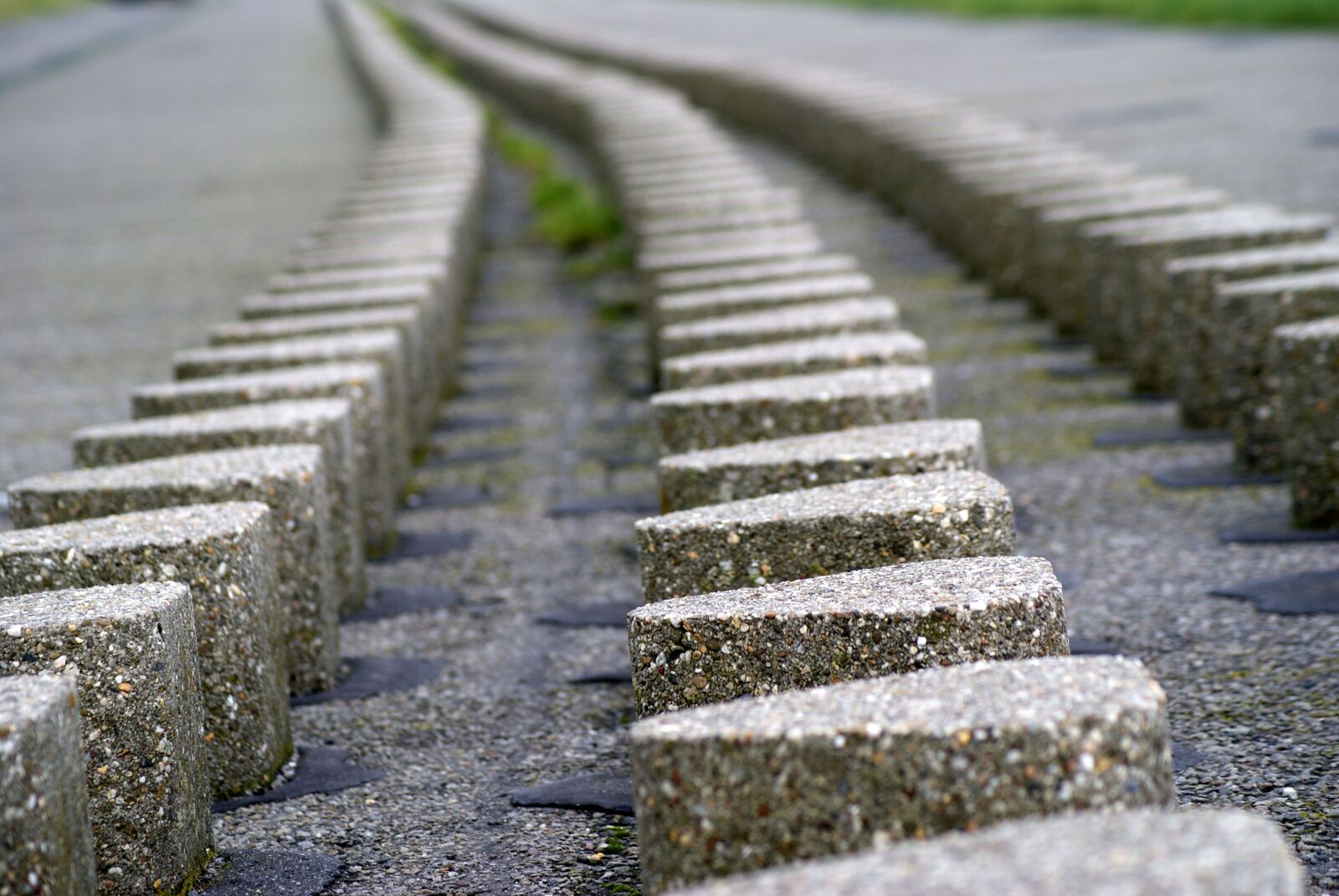 Sony Alpha DSLR-A200 sample photo. Stones, line, dam photography