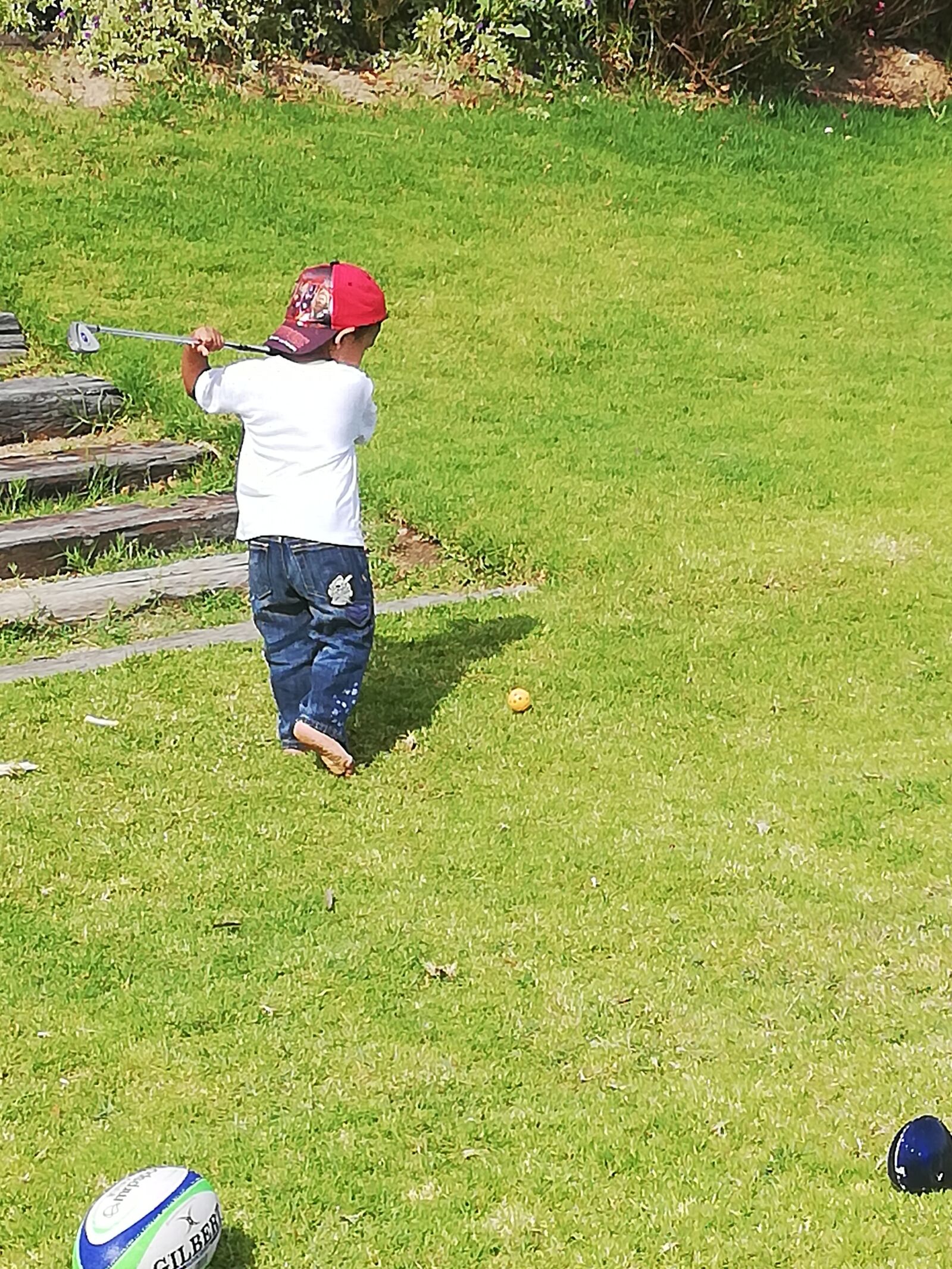 HUAWEI P20 lite sample photo. Kid playing golf, boy photography