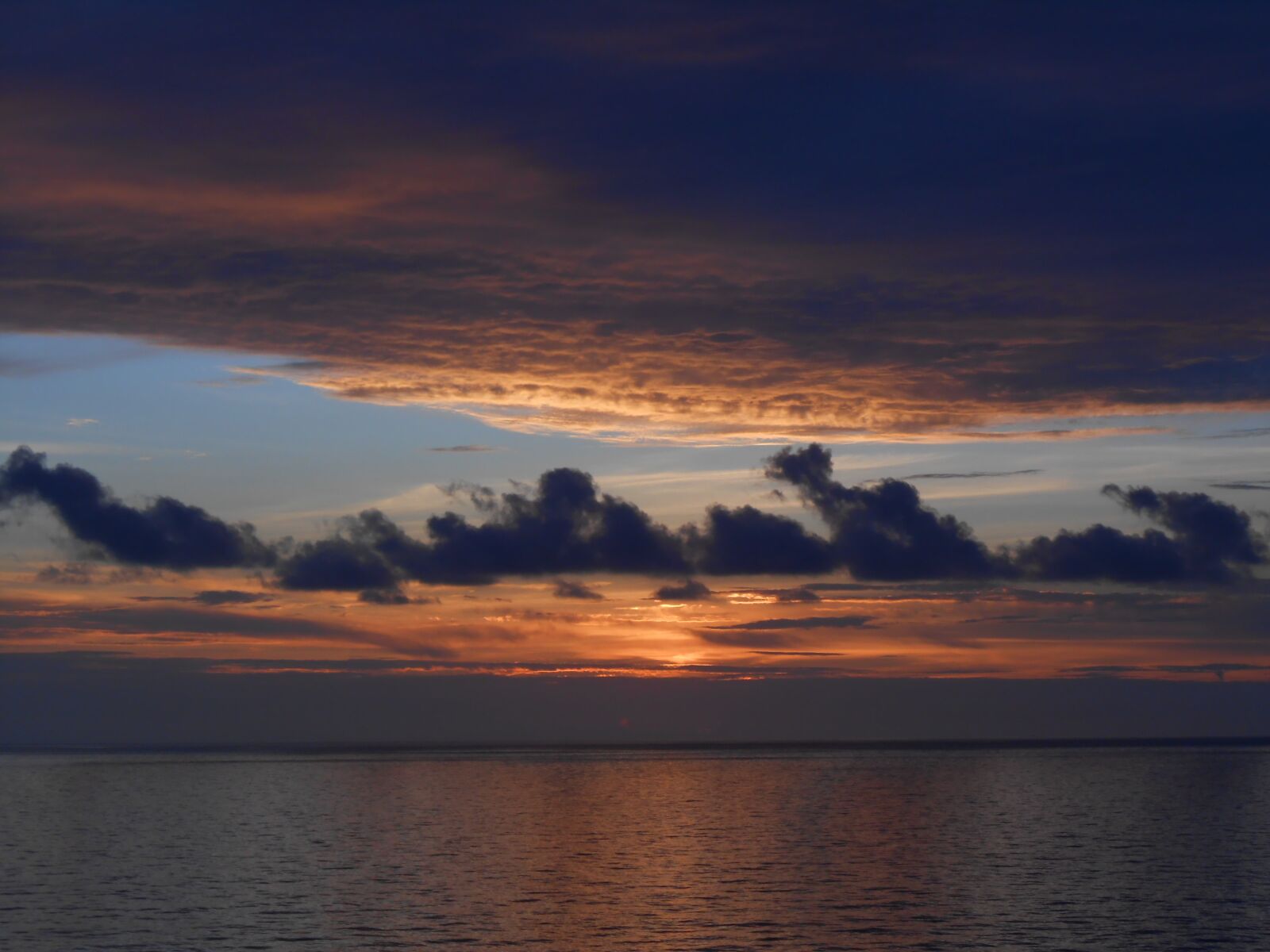 Nikon Coolpix S3300 sample photo. Ocean, blue skies, sunsets photography