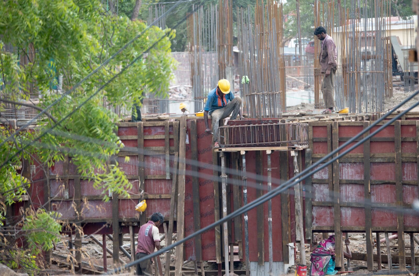 Nikon D3200 sample photo. Under construction, men at photography