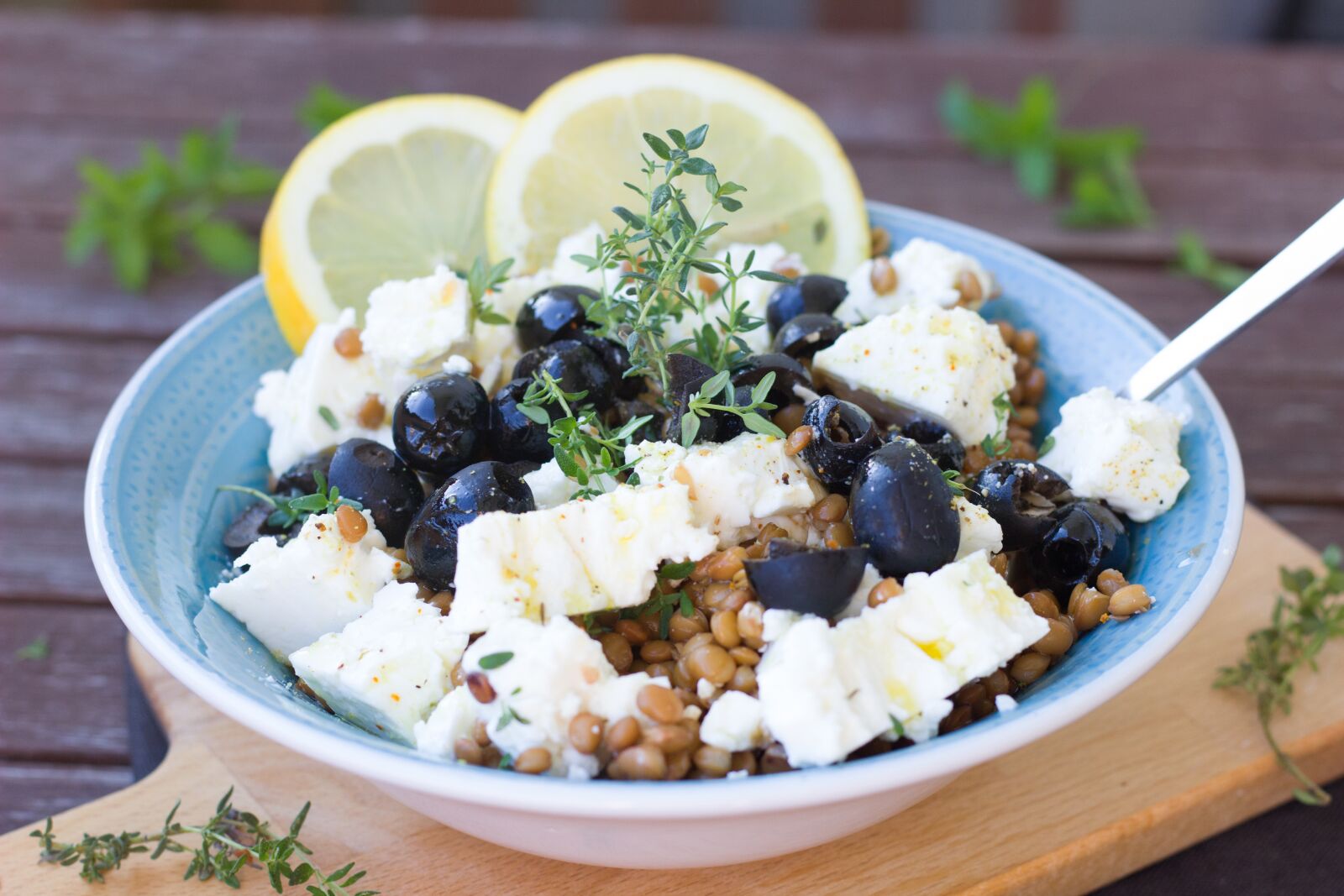 Canon EOS 600D (Rebel EOS T3i / EOS Kiss X5) + Canon EF 50mm F1.8 STM sample photo. Salad, lenses, olives photography