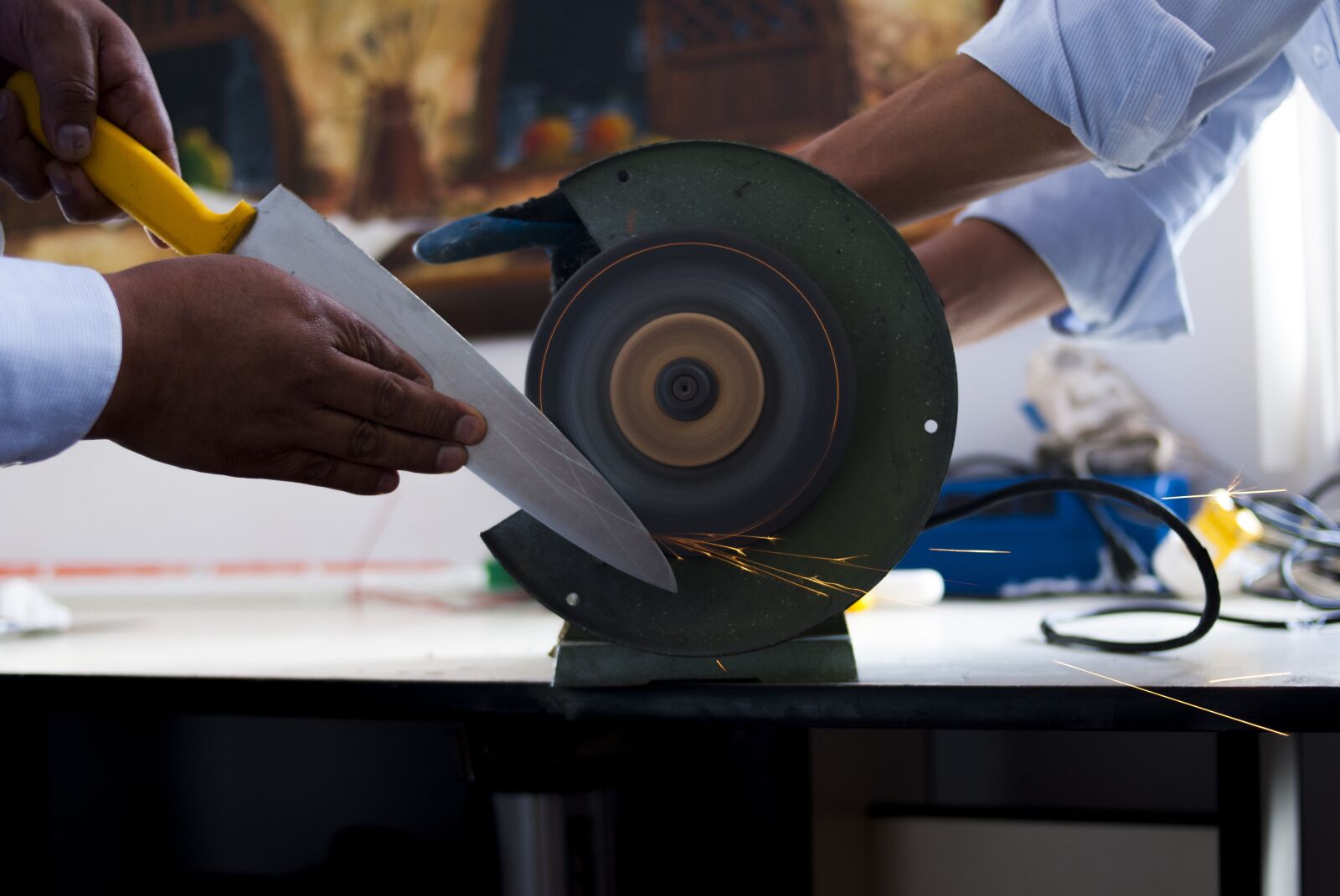Nikon D60 sample photo. Sharpening, knife, metal photography