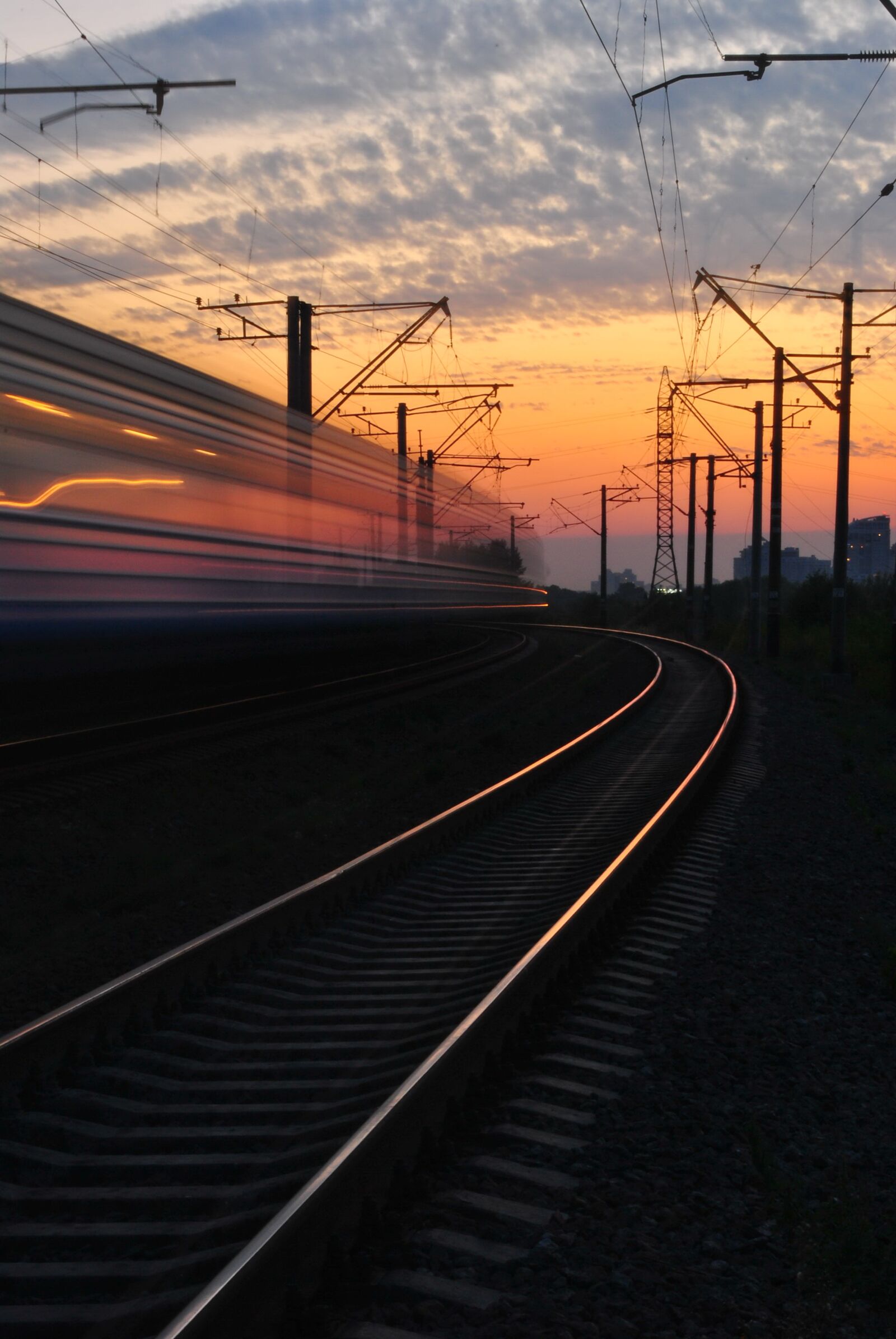Nikon D3000 sample photo. Sunset, train, road photography