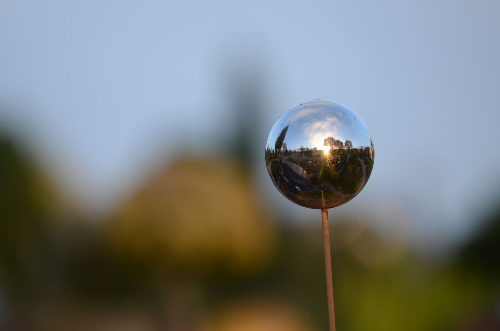 Nikon D7000 sample photo. Sunset, reflection, graveyard photography