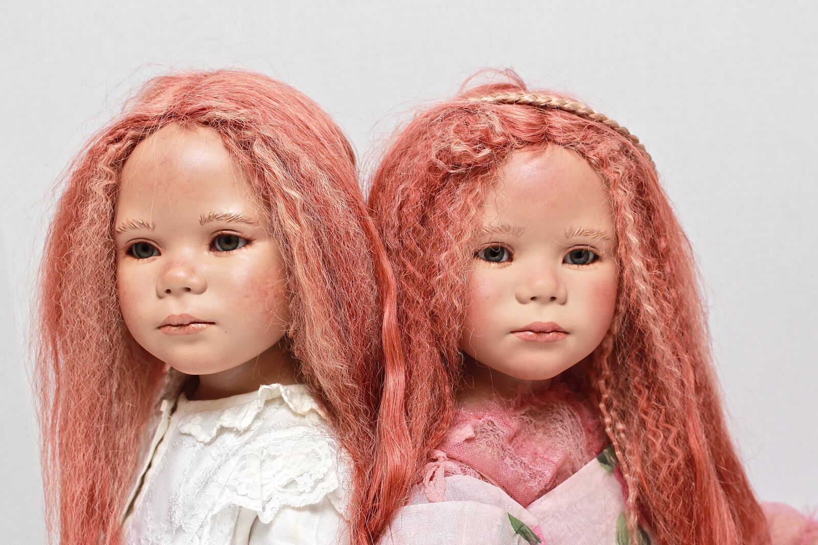 Canon EOS 60D + Canon EF 40mm F2.8 STM sample photo. Twin redheads, serious, dolls photography