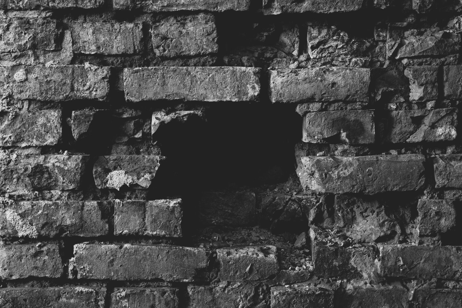 Canon EF 24-105mm F4L IS USM sample photo. Black, brick, destroy, hole photography