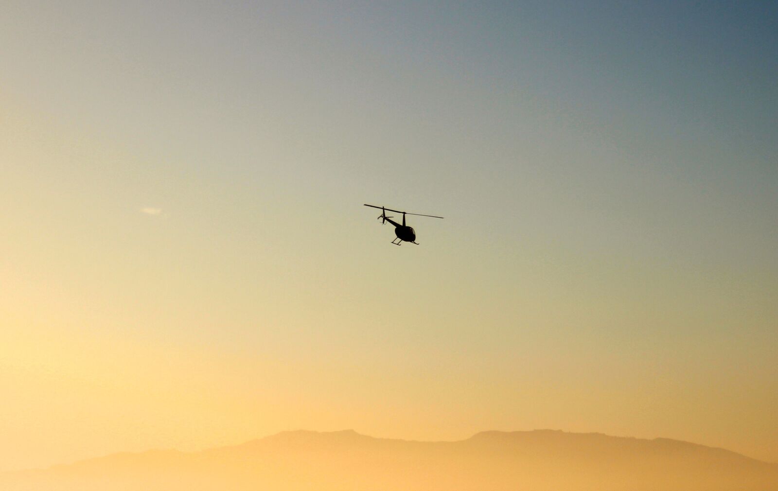 EF35-80mm f/4-5.6 sample photo. Helicopter, horizon, aerial photography