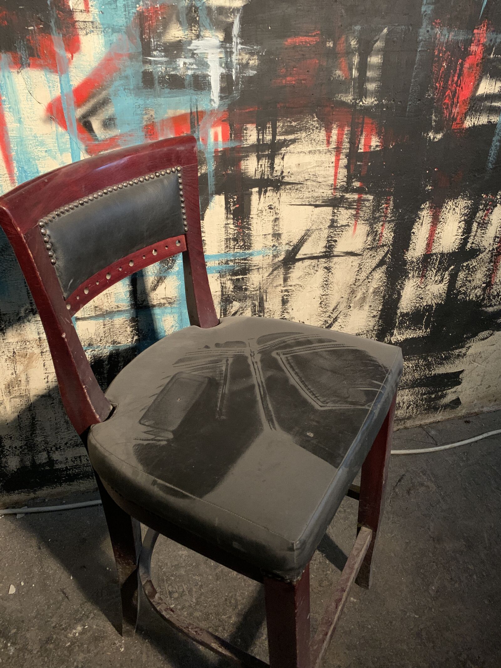 Apple iPhone XS sample photo. Chair, graffiti, spray photography